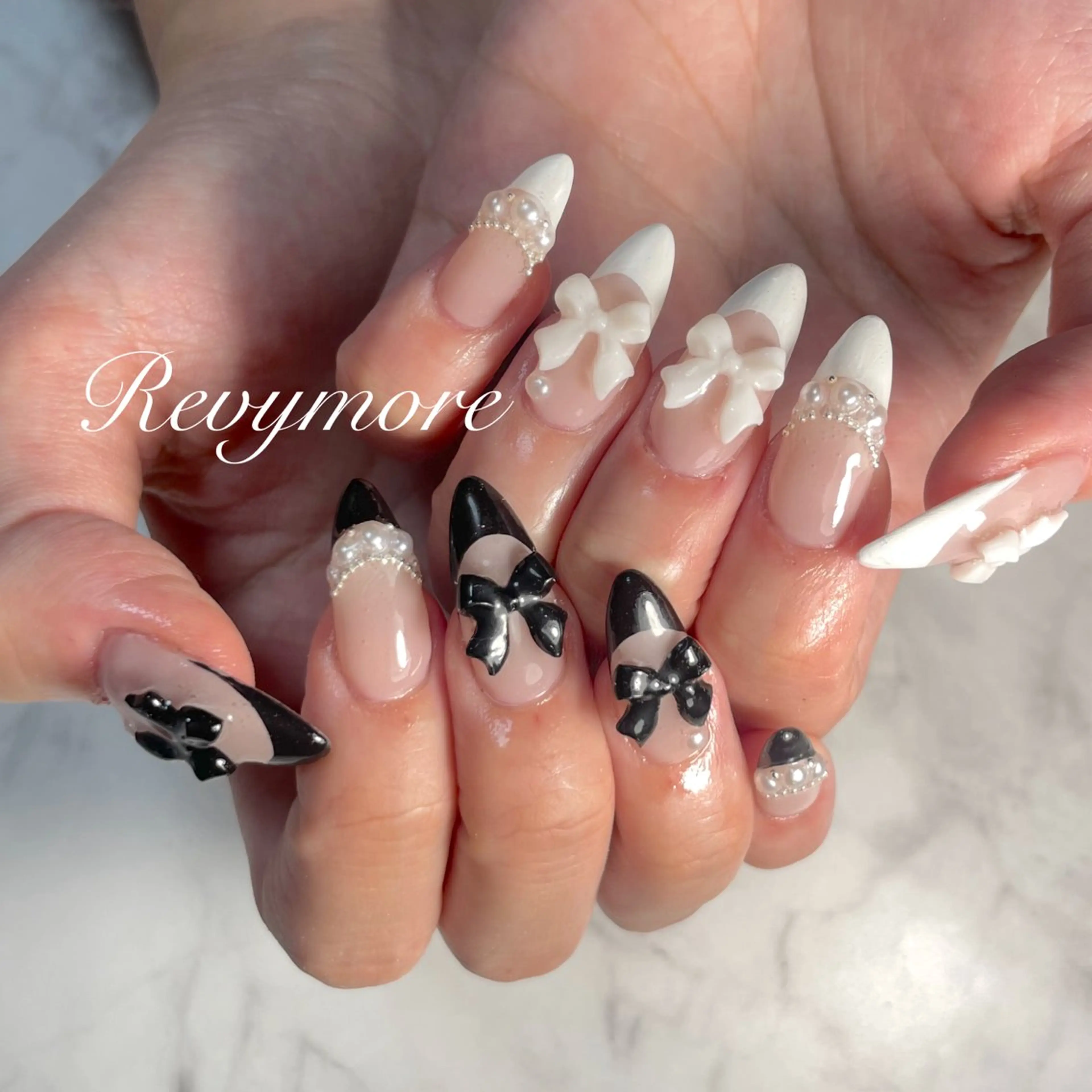 ネイル フレンチネイル ジェルネイル ニュアンスネイル オフィスネイル リボン nail salon Revymore所属・nail salon Revymoreのネイルデザイン