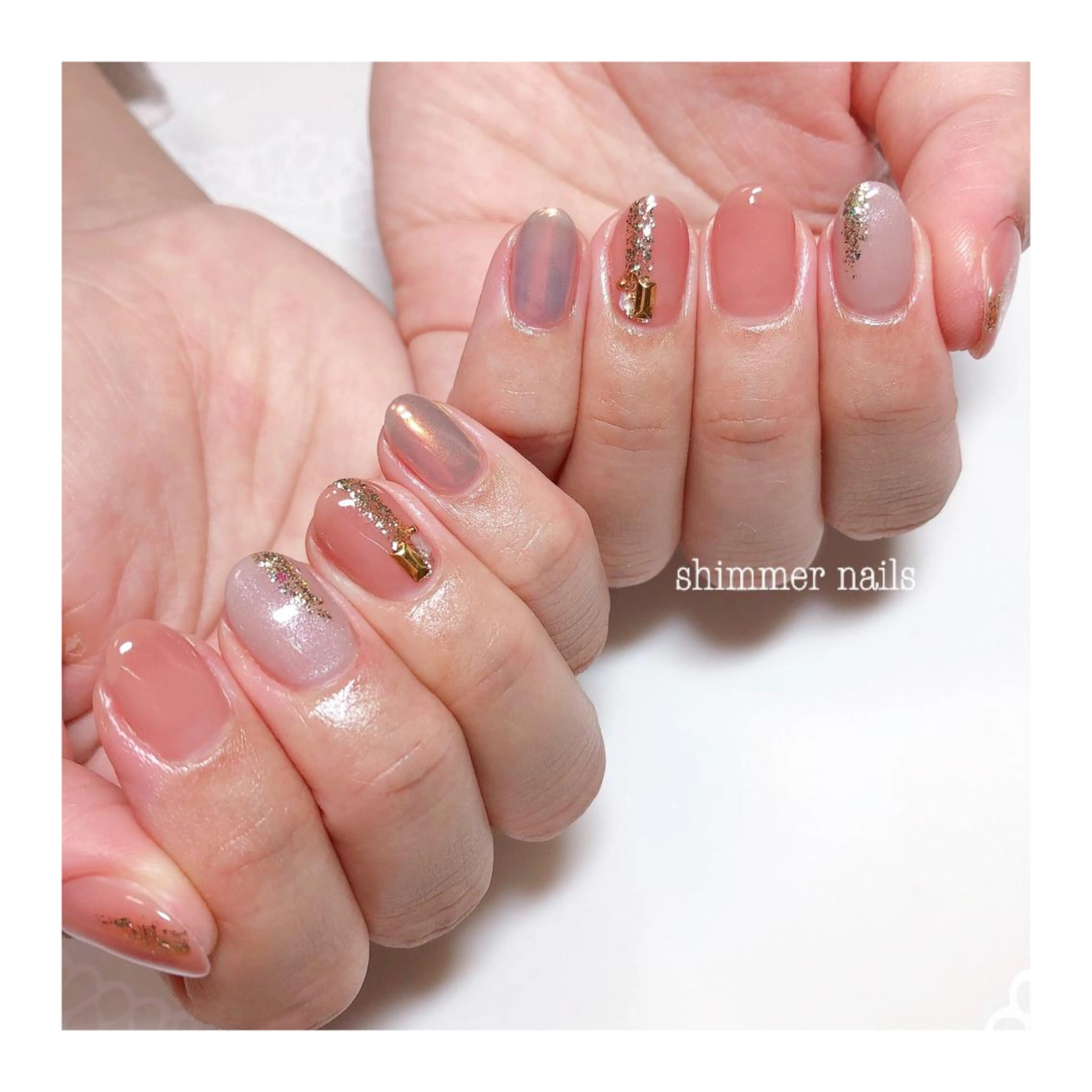 ネイル オーロラネイル オレンジ ピンク ピンクベージュ shimmer nailsのネイルデザイン