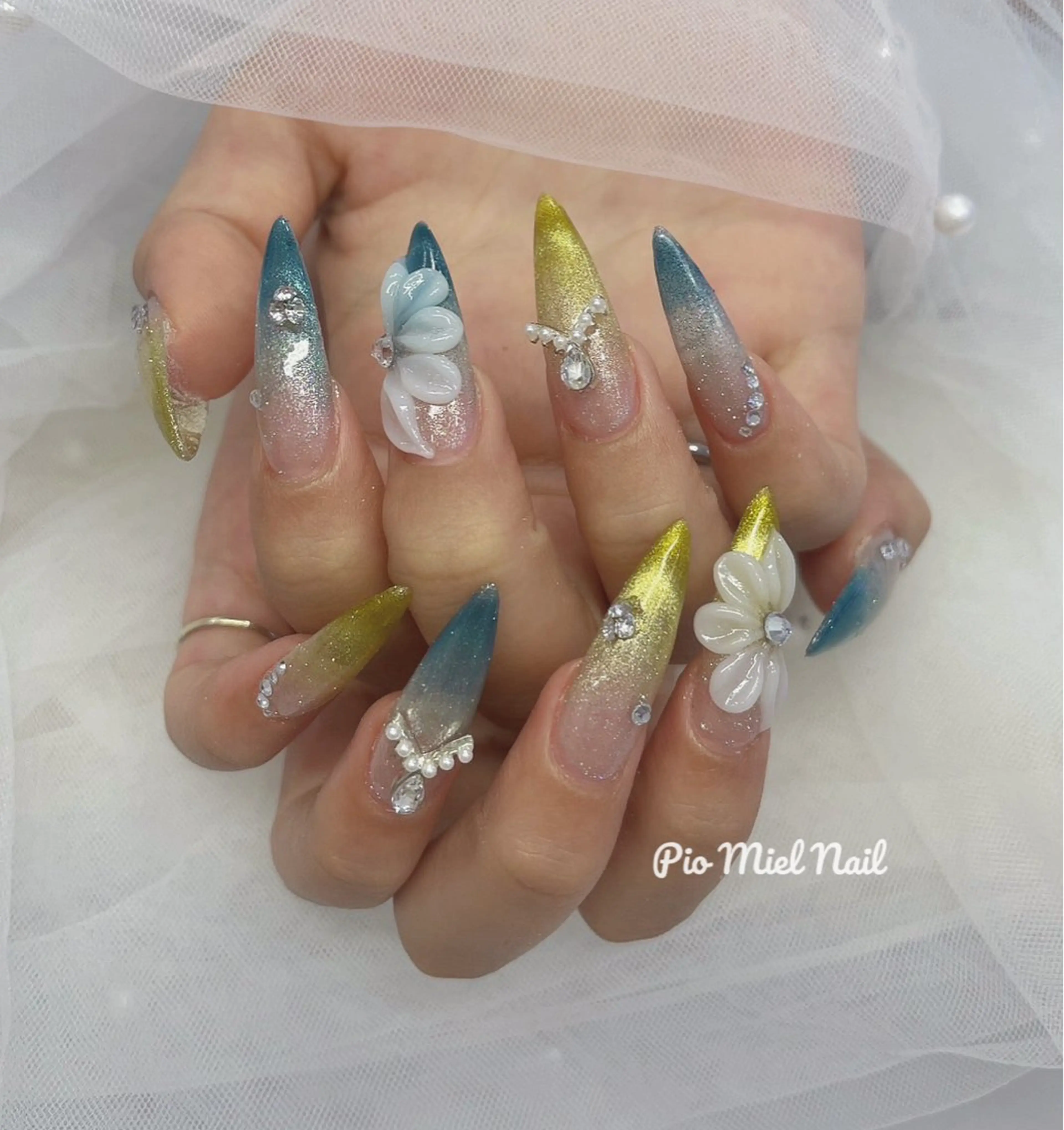 ロング ハンドネイル Pio Mielのネイルデザイン