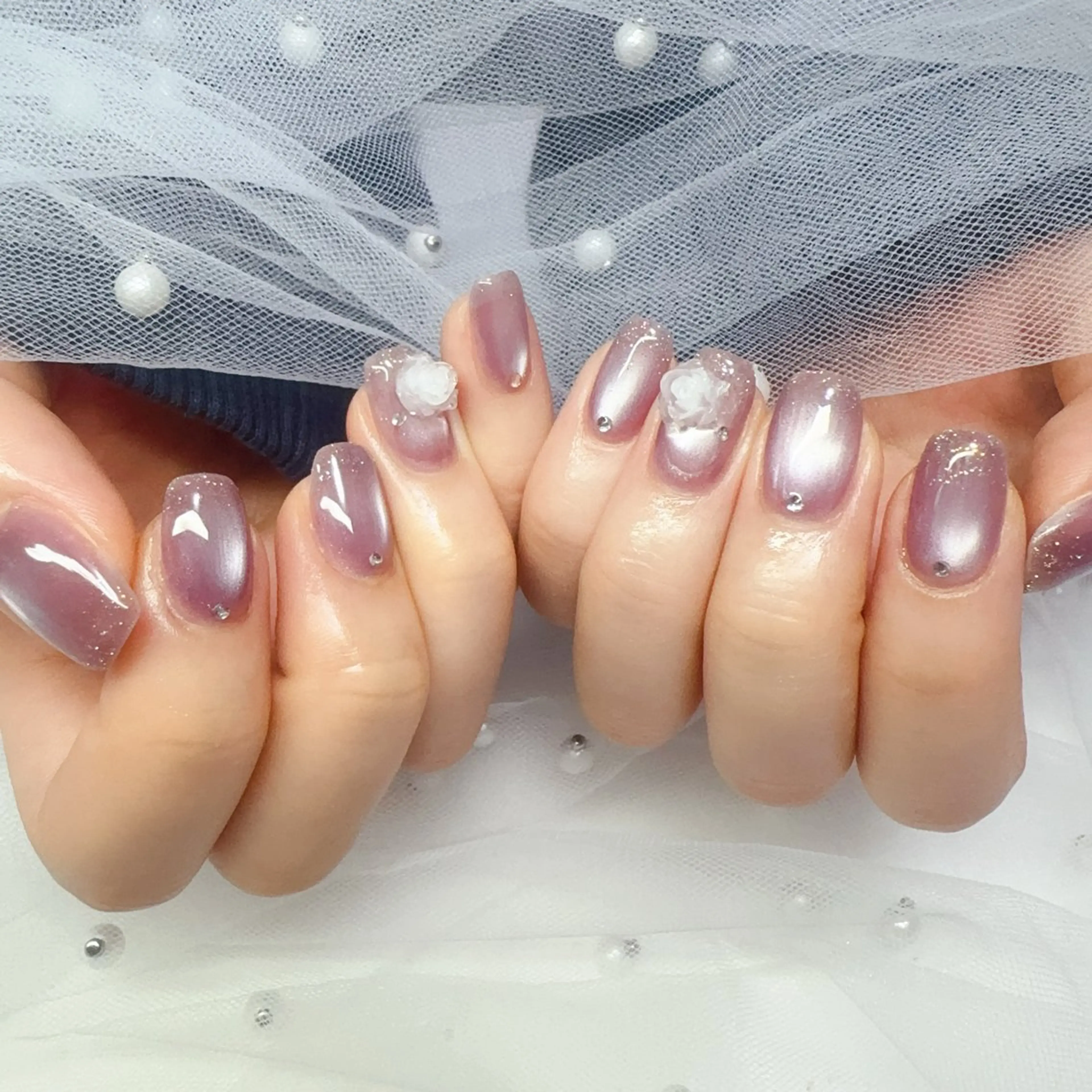 ネイル オーロラネイル チークネイル 桜ネイル 長さ出し ジェルネイル ハンドネイル YUYI.nail salonのネイルデザイン
