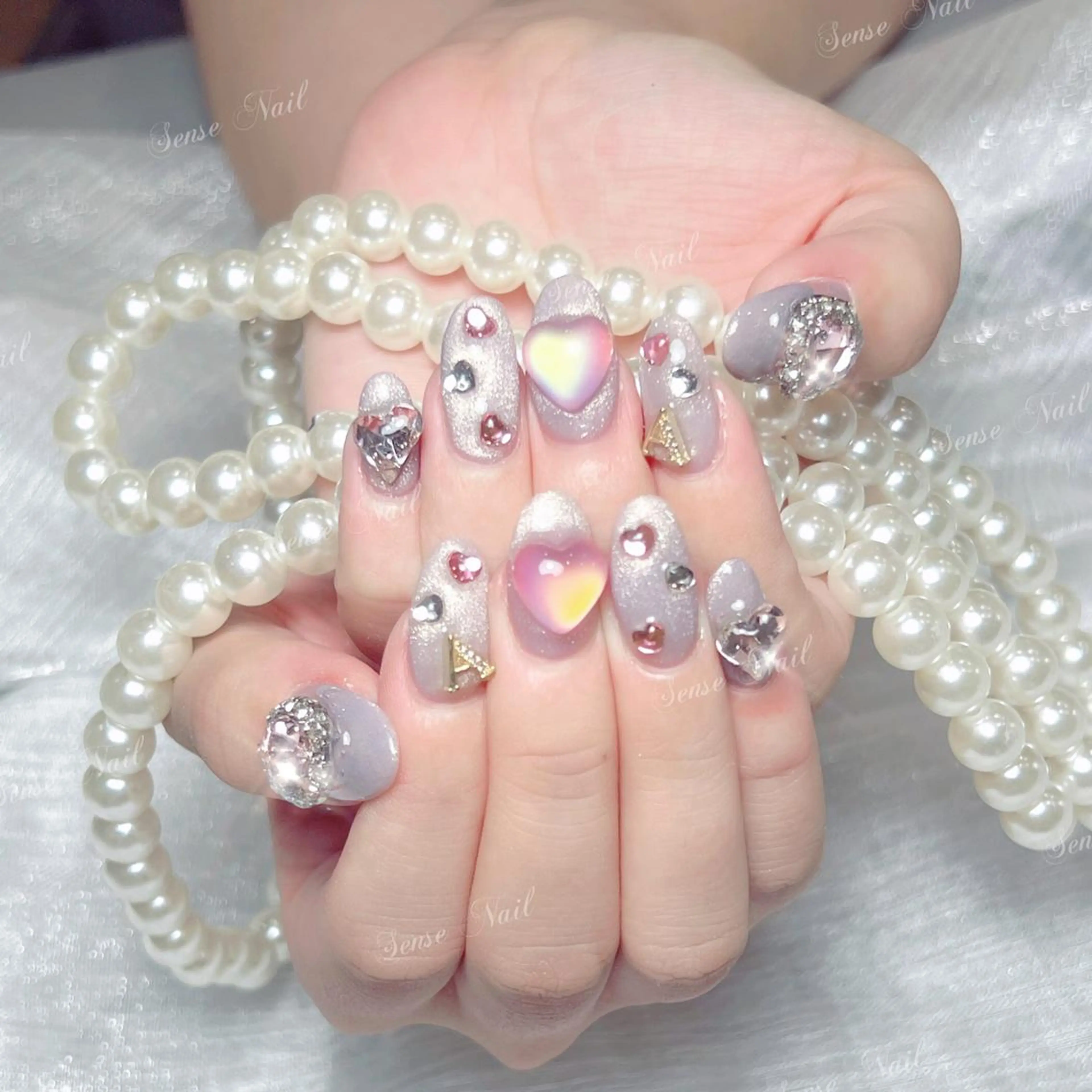 ネイル Queenie 🦋のネイルデザイン