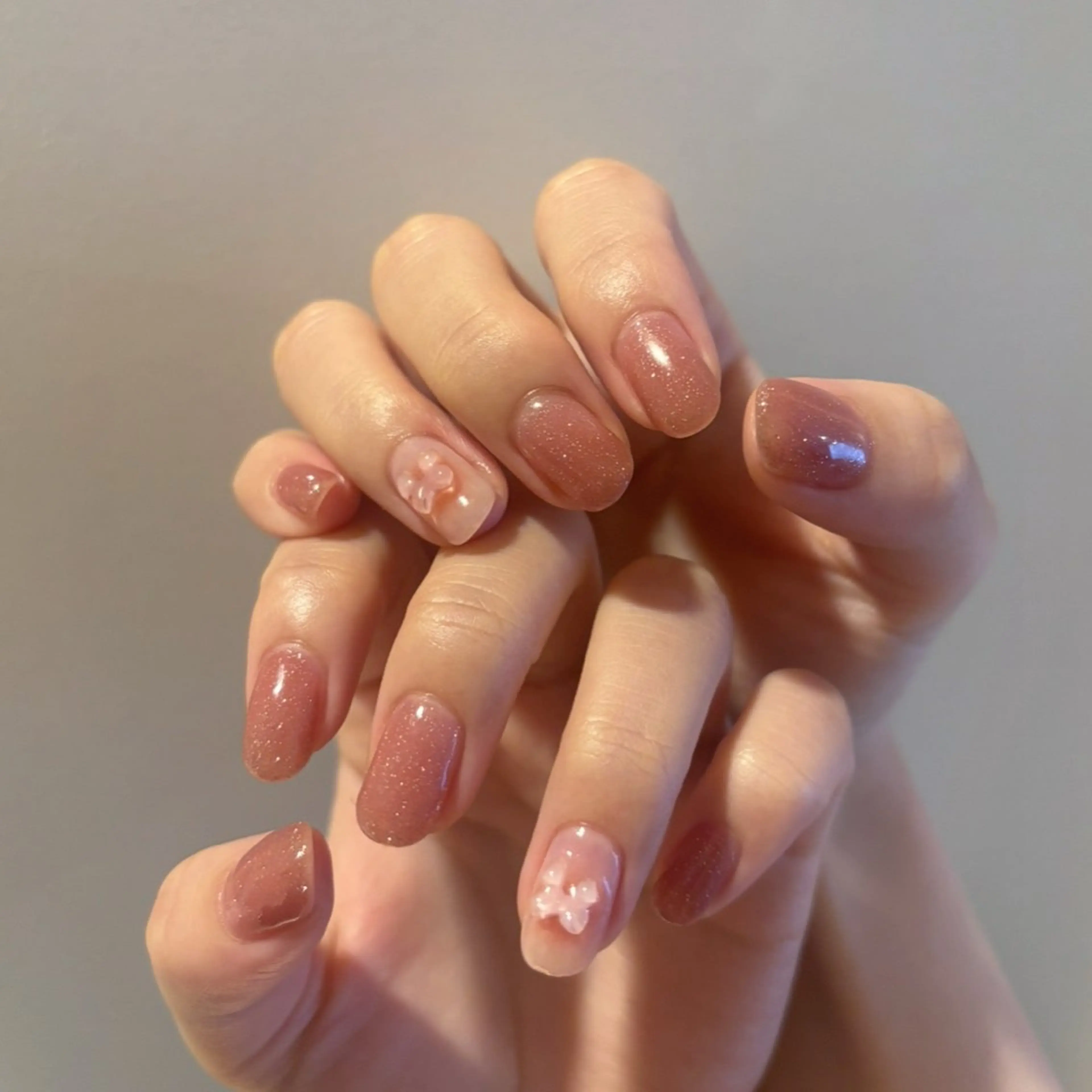 ネイル ピンク リボン ハンドネイル Elio所属・Elio 国泰寺のネイルデザイン