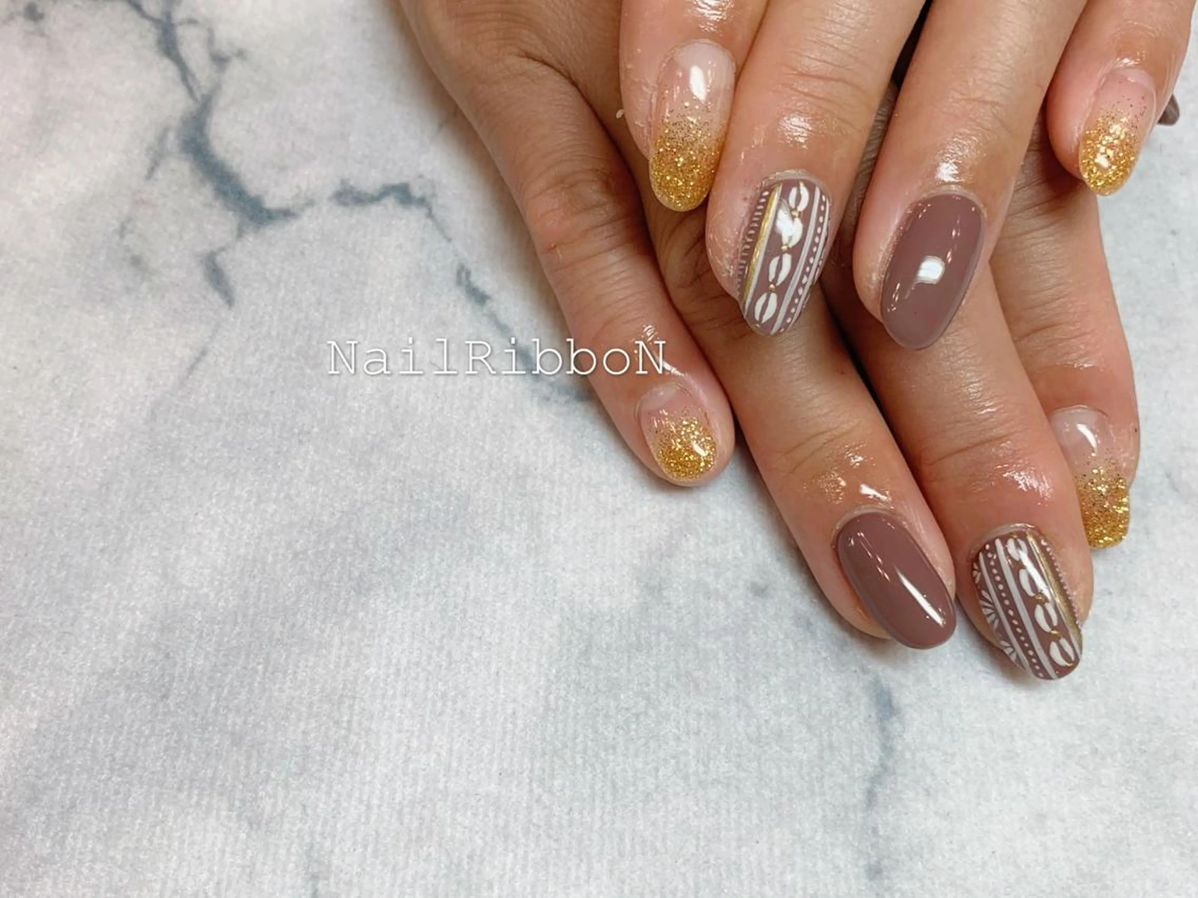 ネイル ネイルリボン 受付スタッフのネイルデザイン