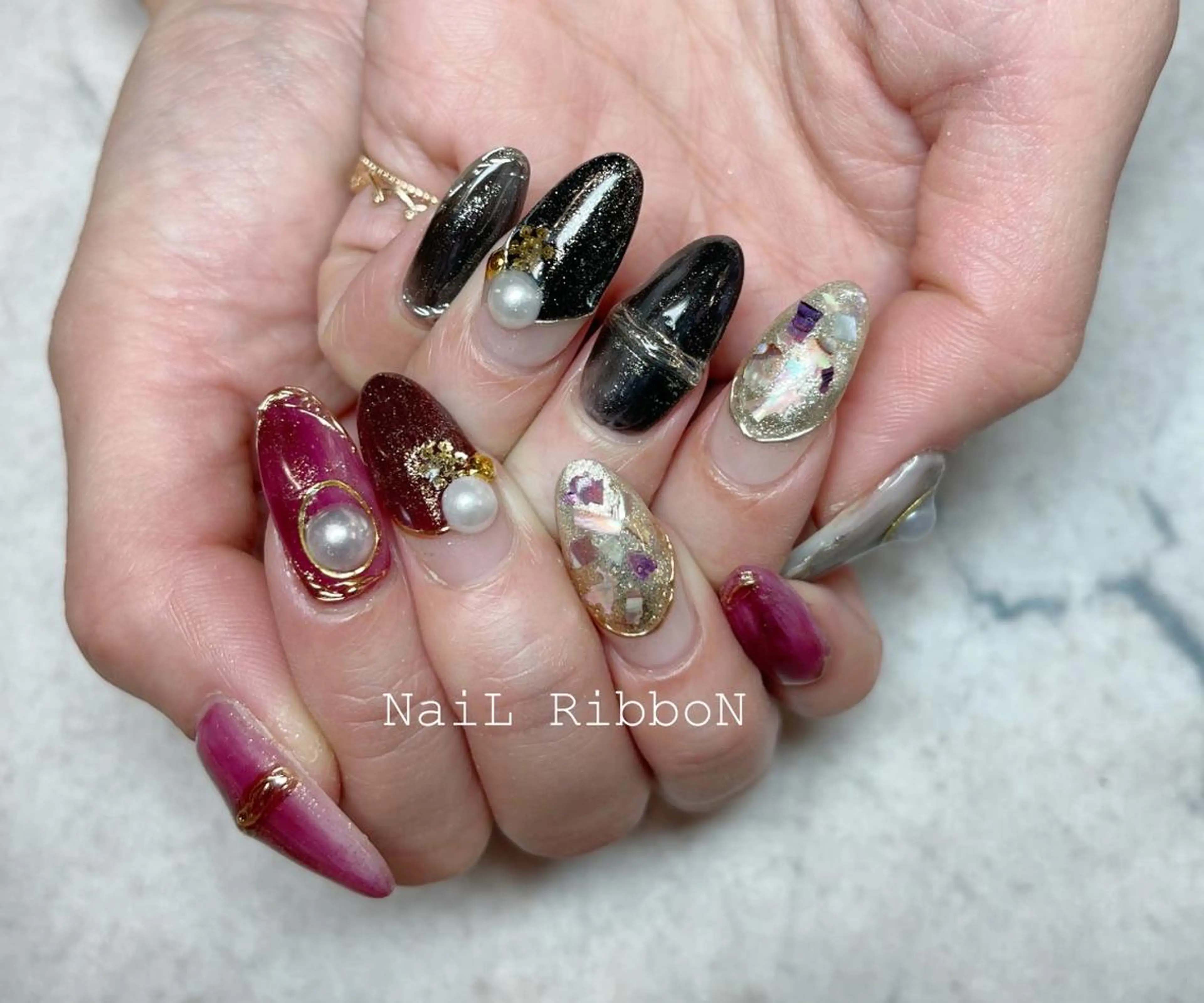 ネイル ネイルリボン 受付スタッフのネイルデザイン