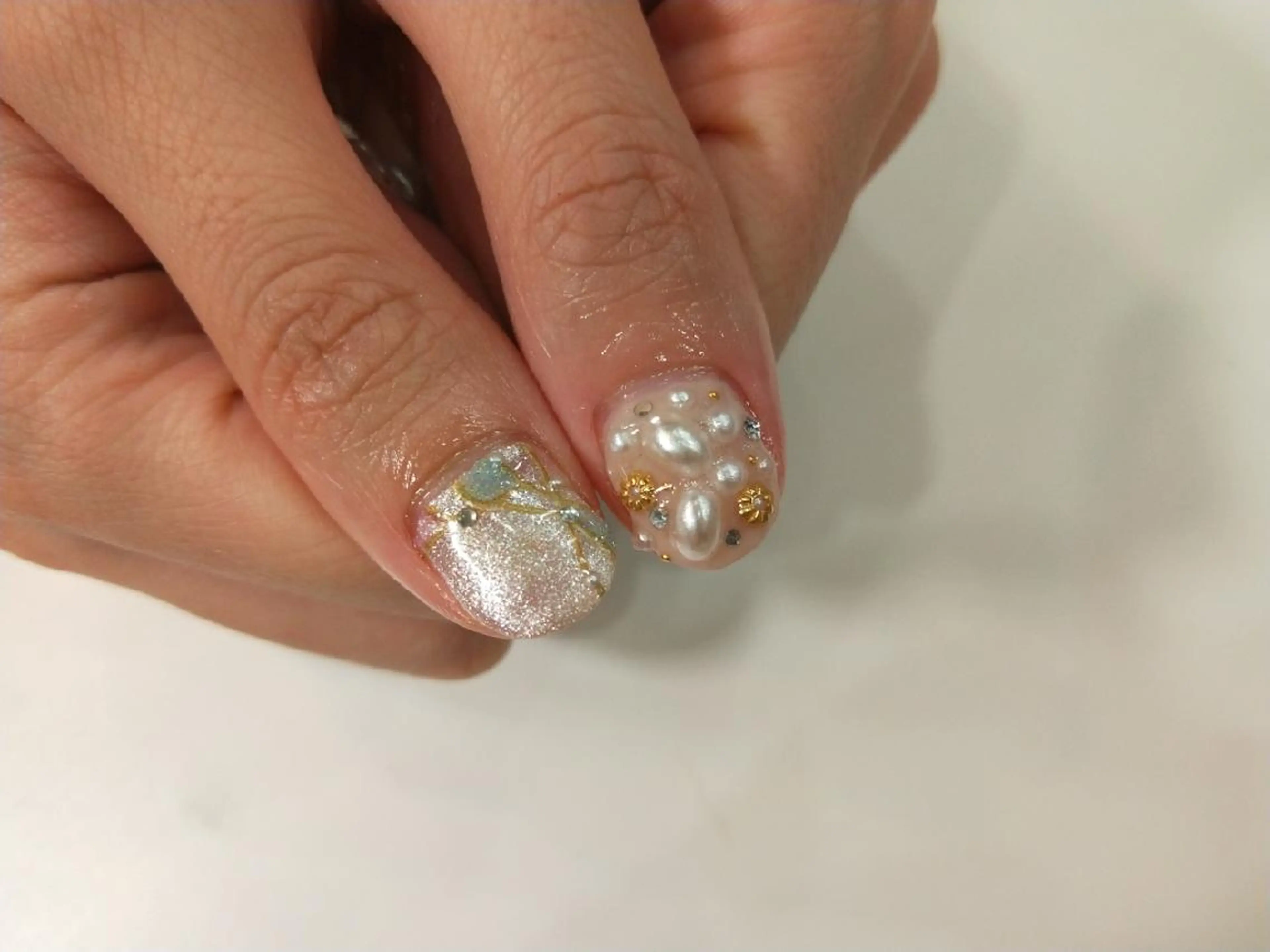 ネイル R'well所属・はばすみれ🎀ﾈｲﾙ 光ﾌｪｲｼｬﾙ ﾍｱのネイルデザイン