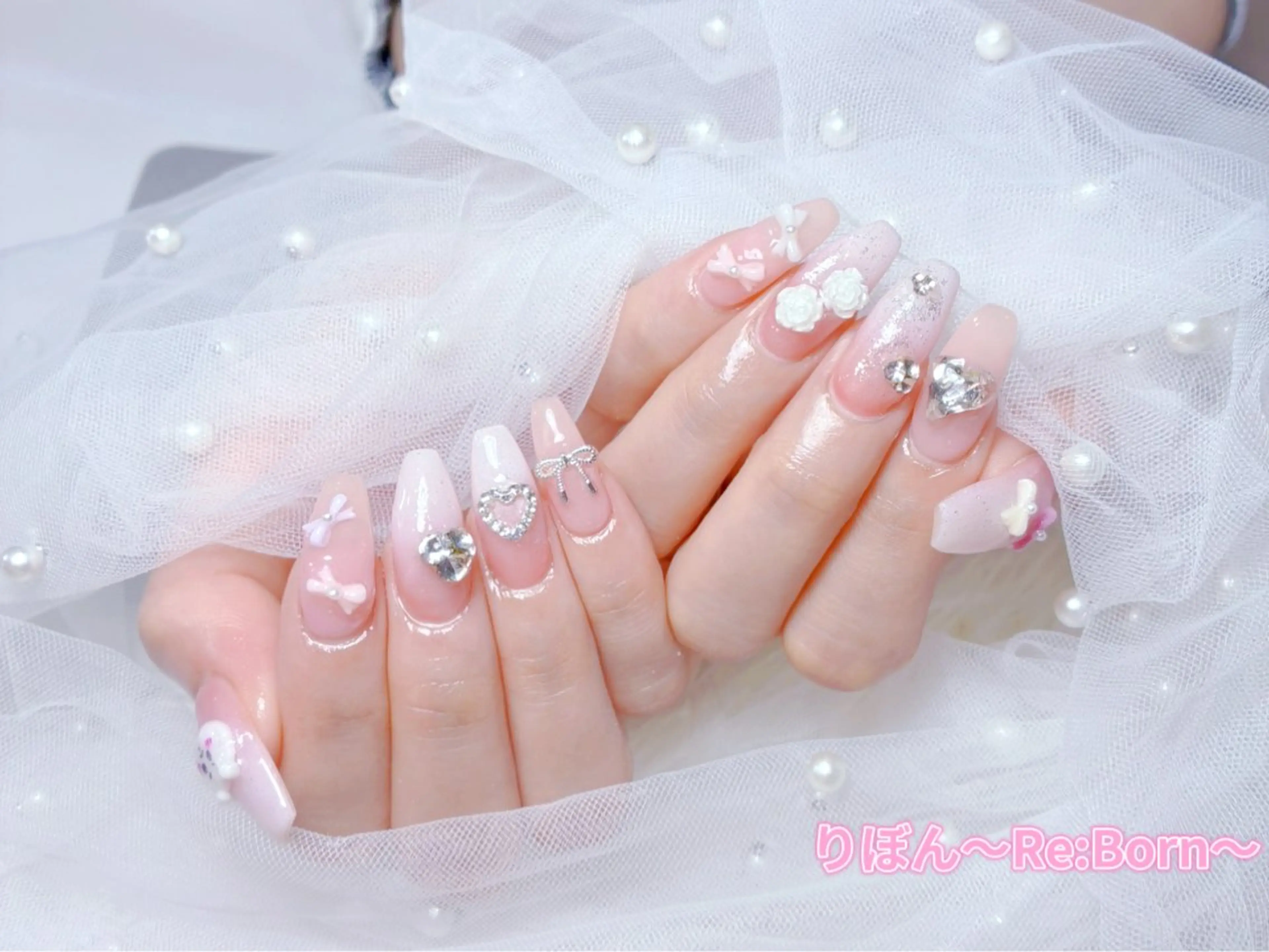 セミロング ハンドネイル りぼん Re:Bonrのネイルデザイン