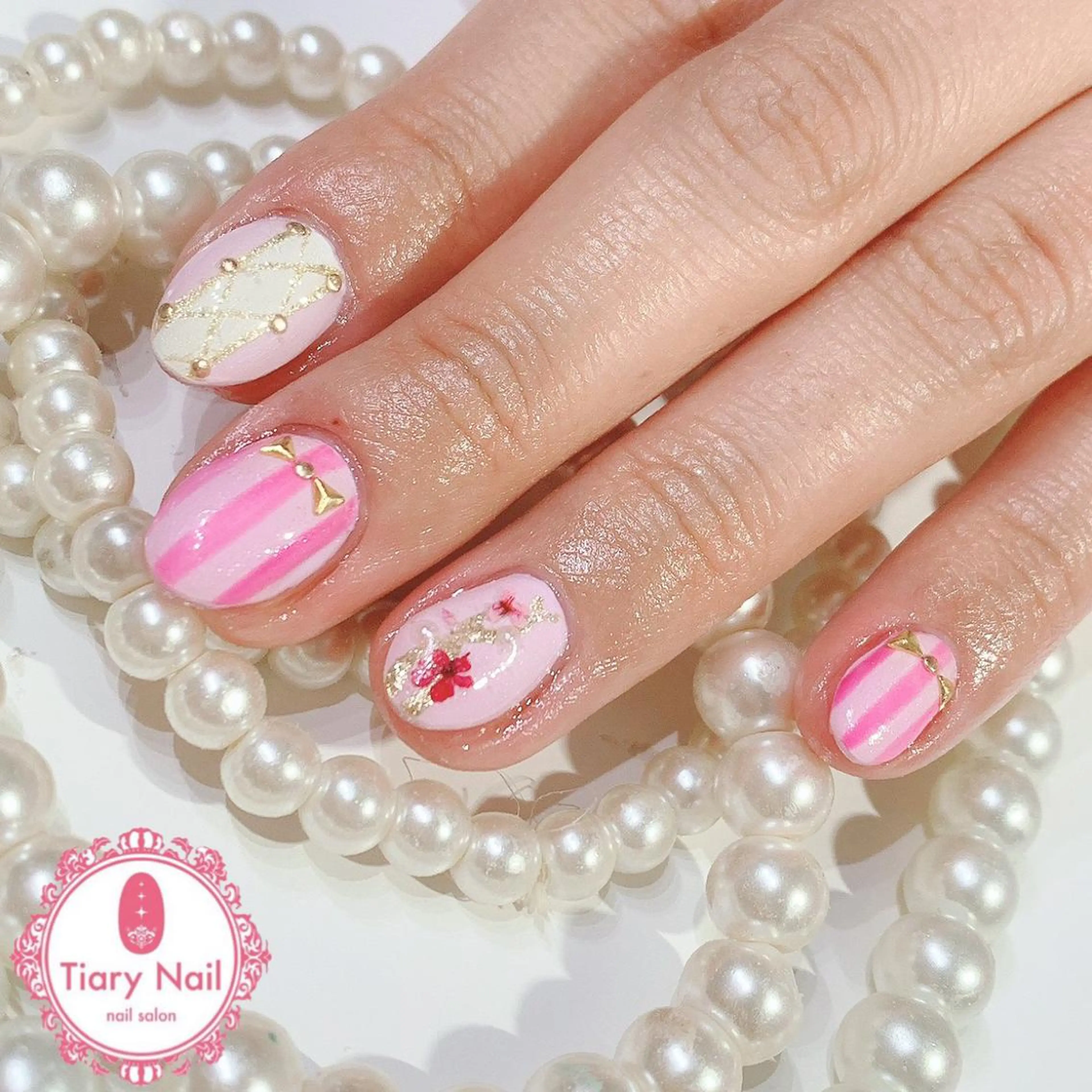 ネイル 桜ネイル クリアネイル フットネイル ジェルネイル キラキラネイル ハンドネイル 💗🪽Tiary Nail🪽💗のネイルデザイン