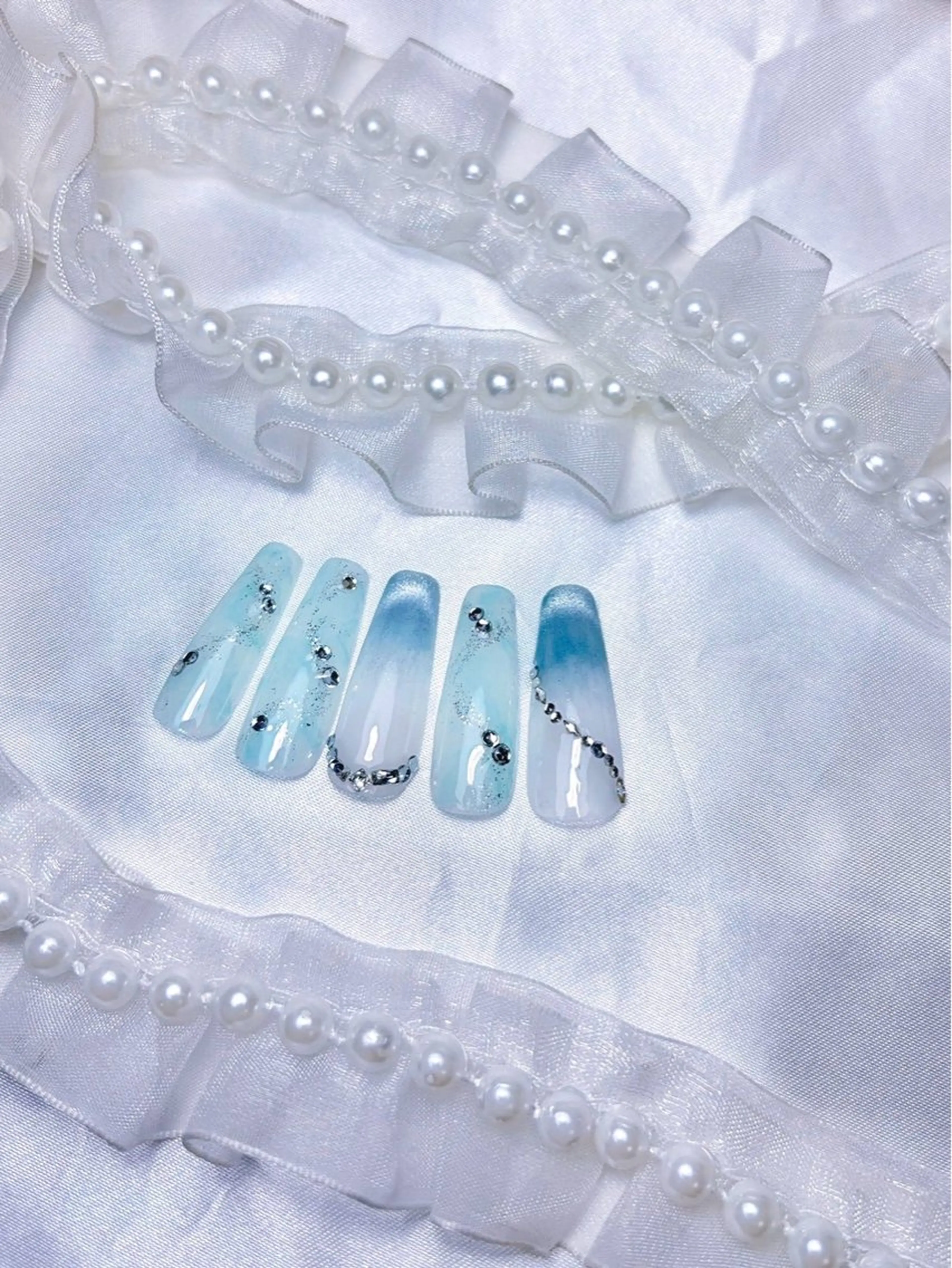 ネイル キラキラネイル ロングネイル マグネットネイル 辻崎 来里のネイルデザイン