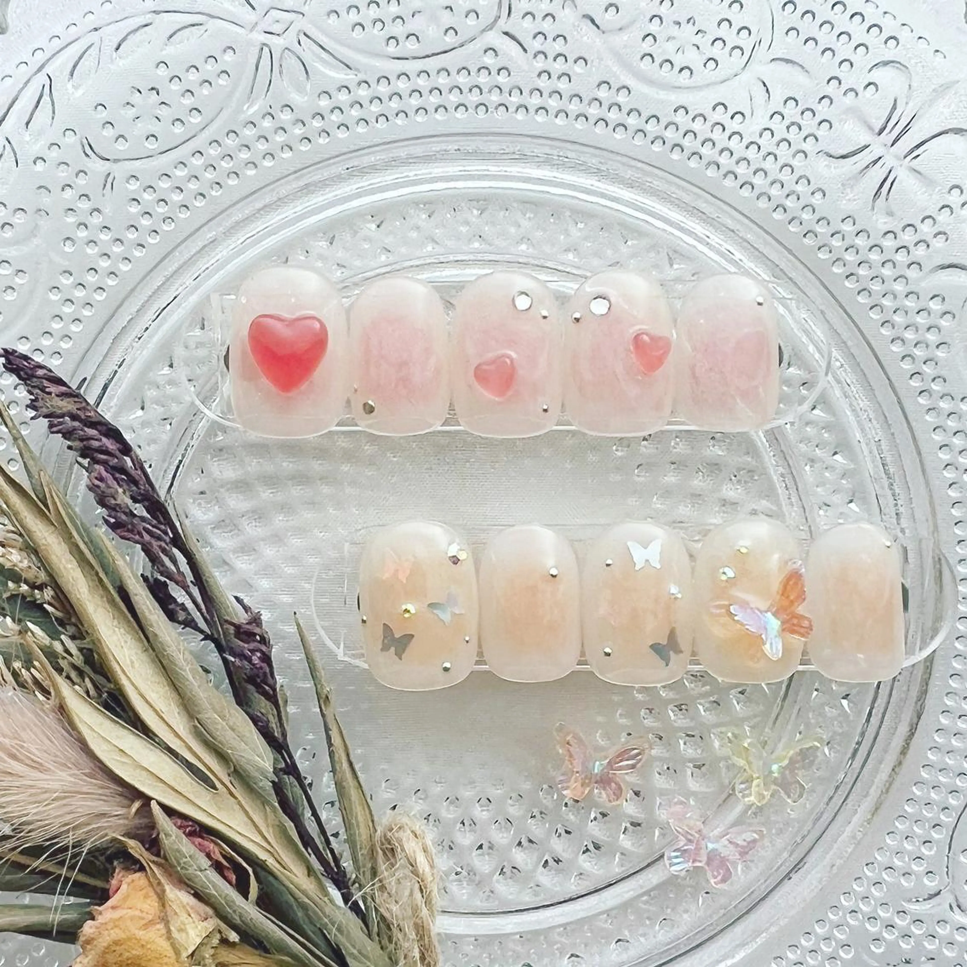 ネイル チークネイル ハート ニュアンスネイル オレンジ ピンク ハンドネイル peaberry nailのネイルデザイン