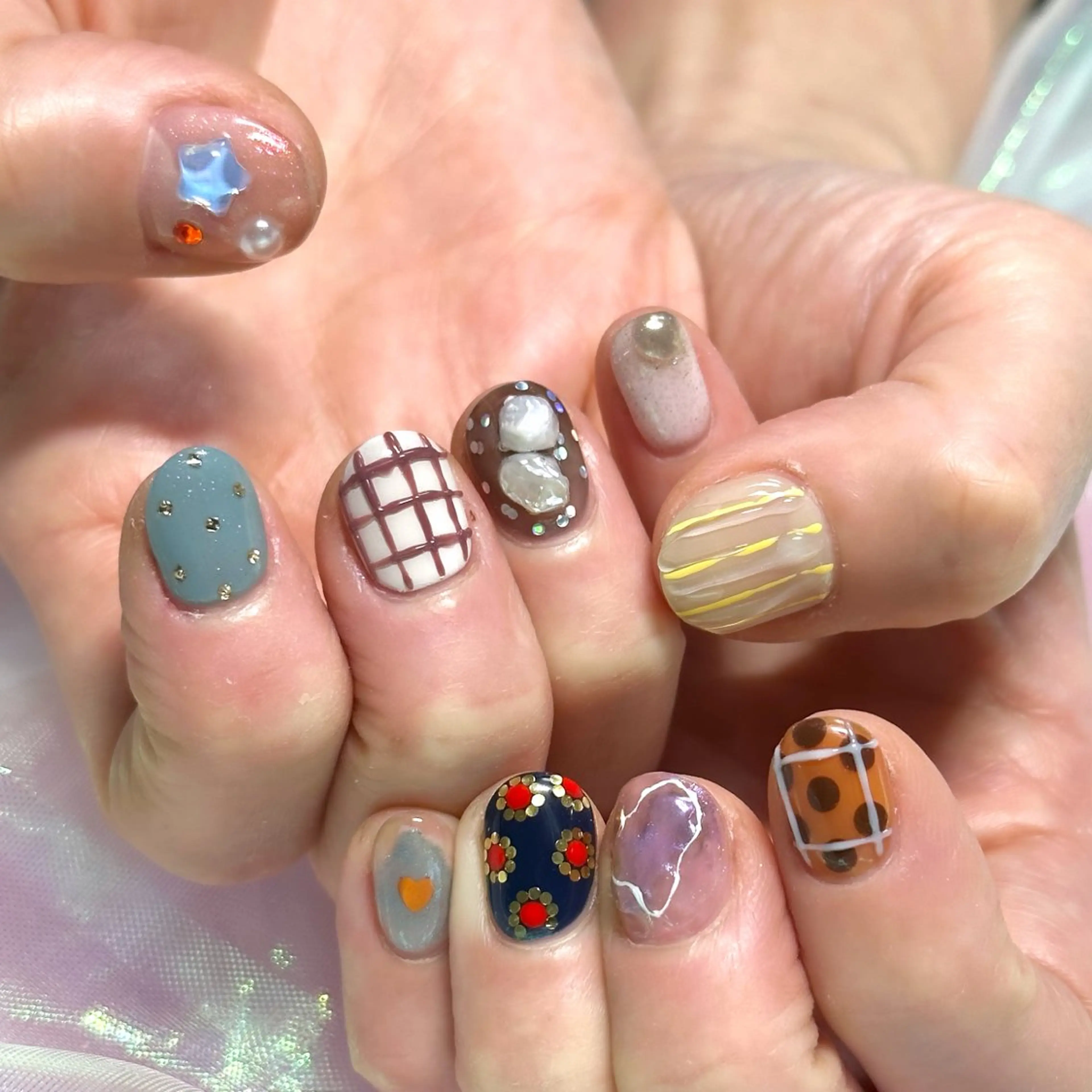 ネイル ハンドネイル OKIKA所属・【OKIKA】 らん🦖🌈🧡のマツエク・マツパデザイン