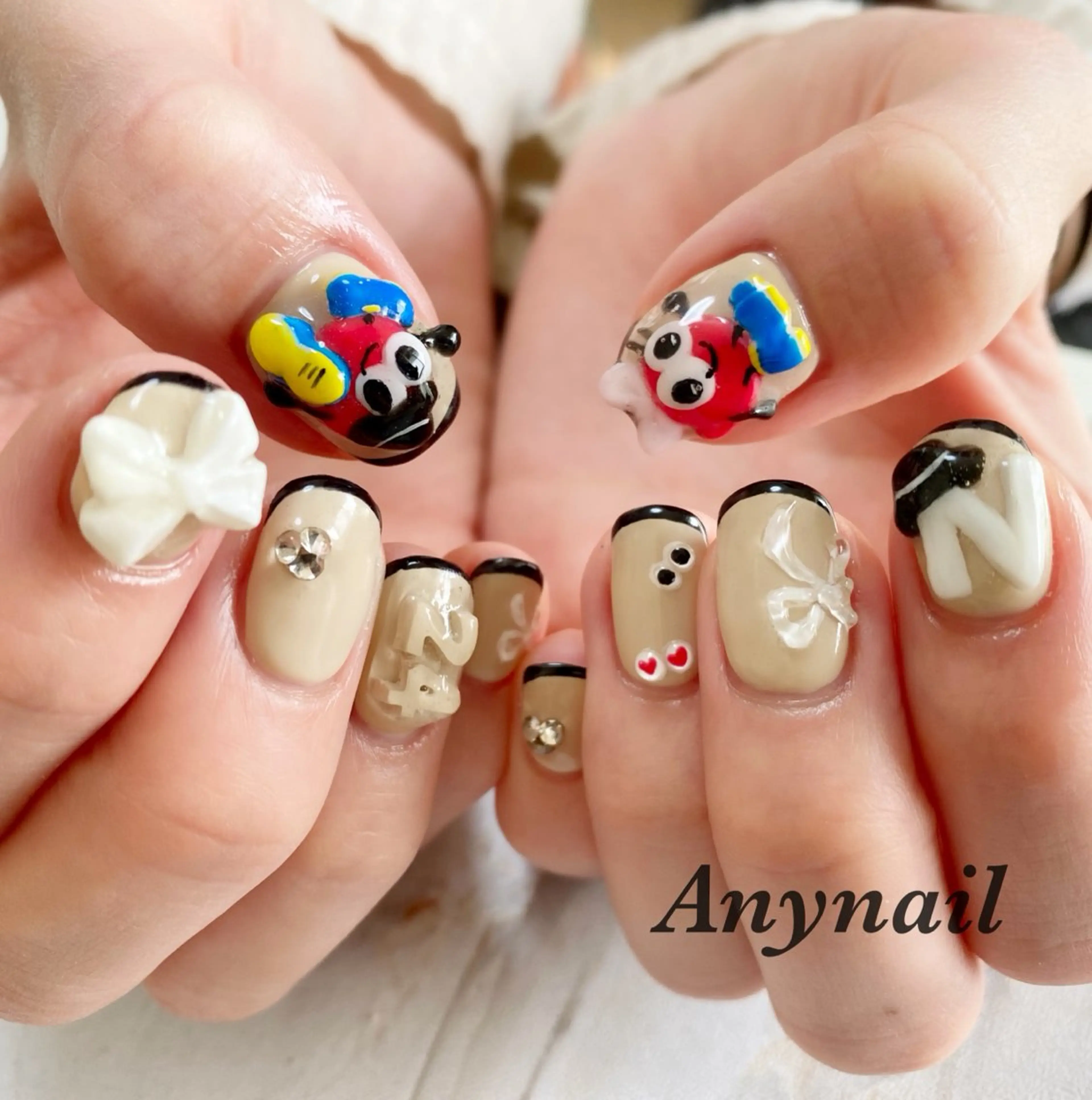 ネイル ブルー リボン 岩澤 恵子のネイルデザイン