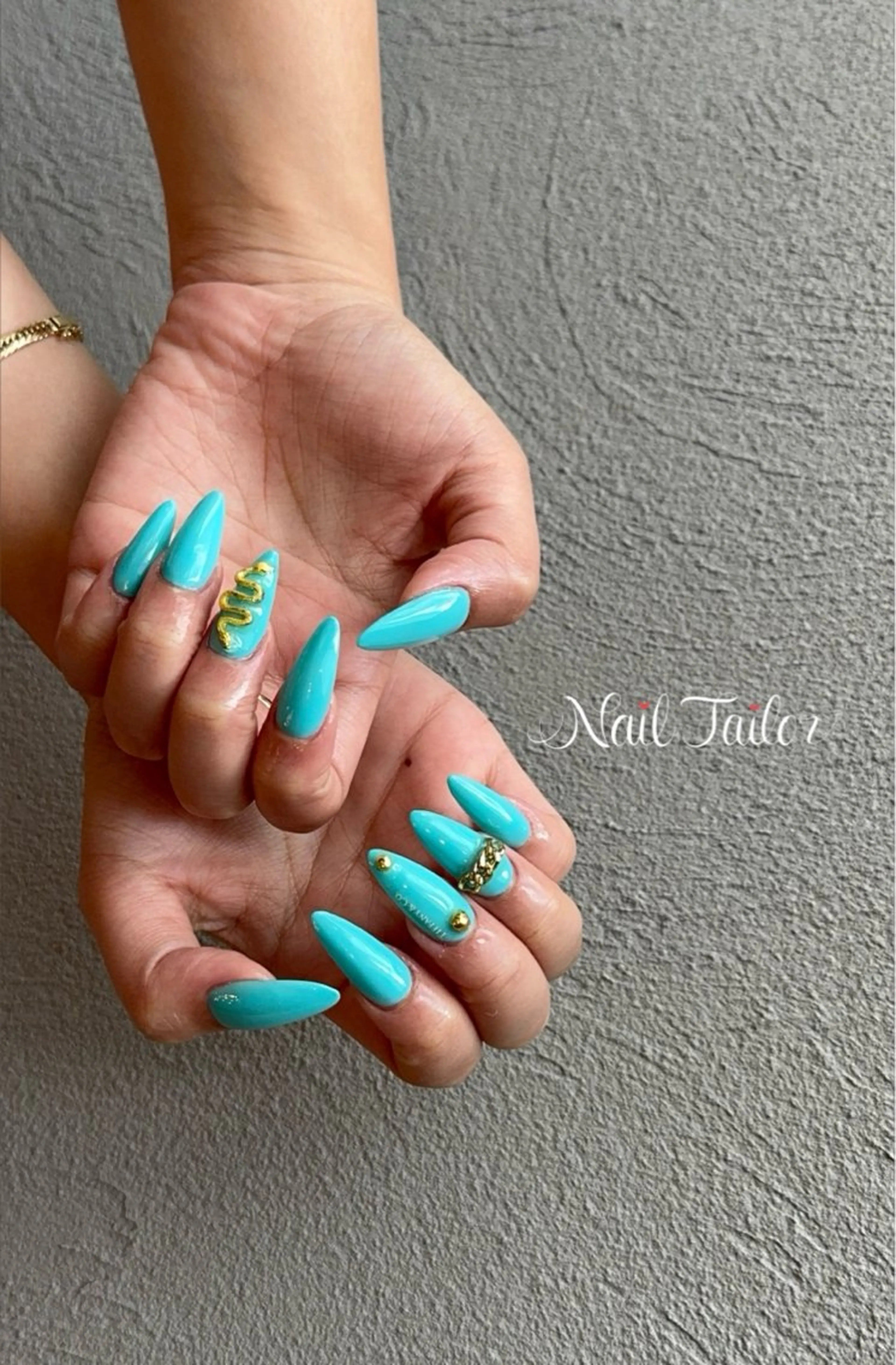 ネイル ブルー 長さ出し ゴールド ゴージャス 水色 ハンドネイル 〜Nail Tailor〜　ネイルテイラー所属・NailTailor ネイルテイラーのネイルデザイン