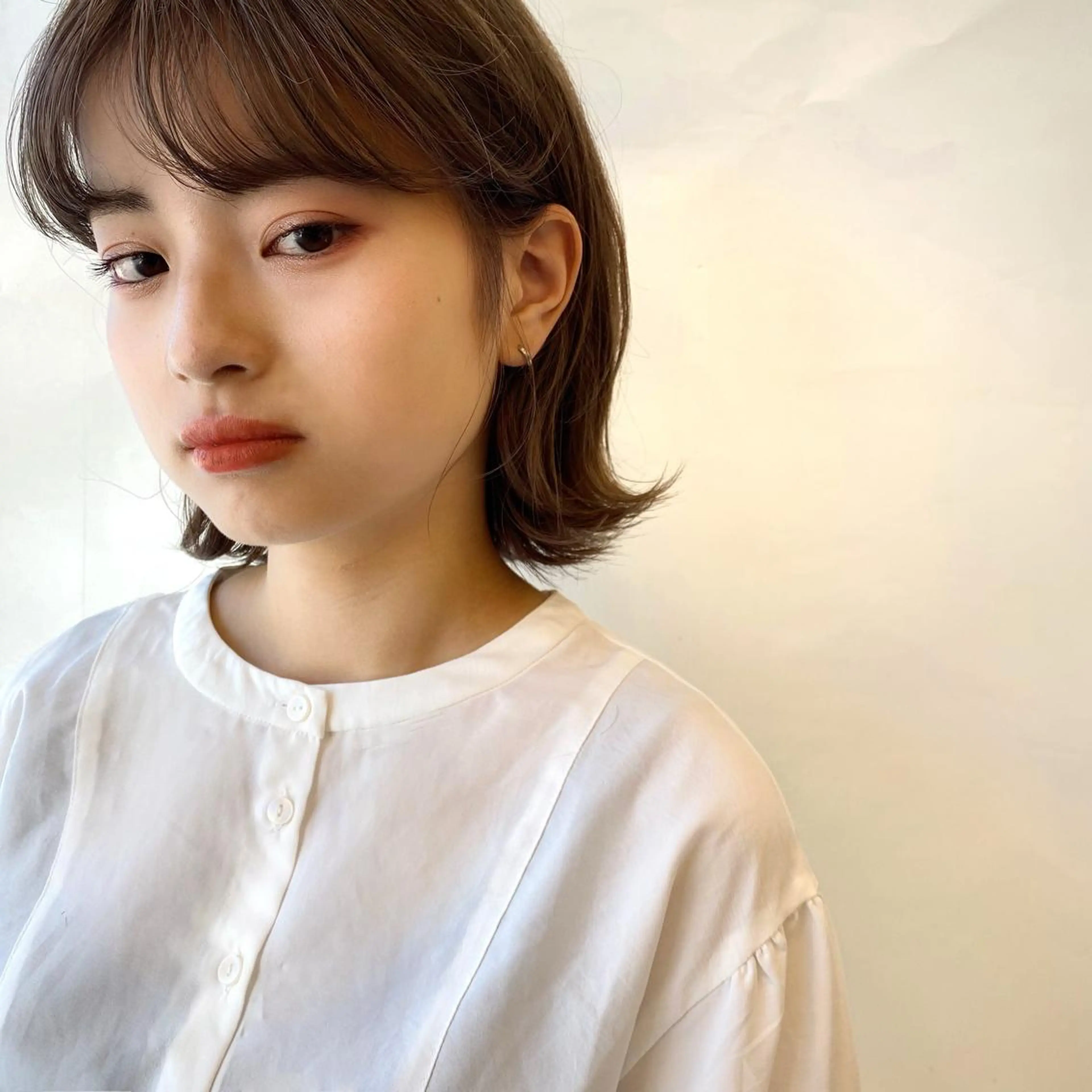 ミディアム ボブ 外ハネヘア hyuga/パーマ /ニュアンスパーマのヘアスタイル