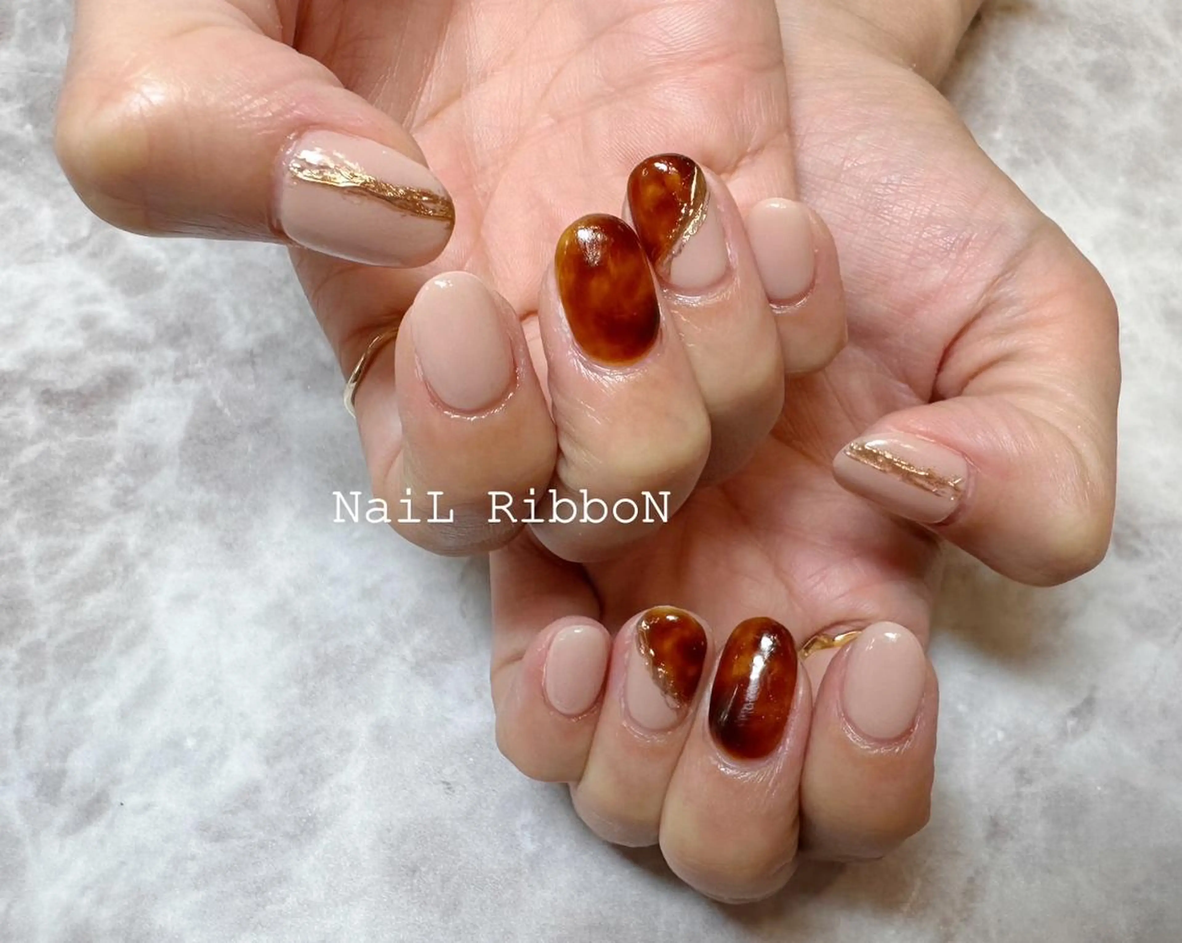 ネイル ネイルリボン 受付スタッフのネイルデザイン