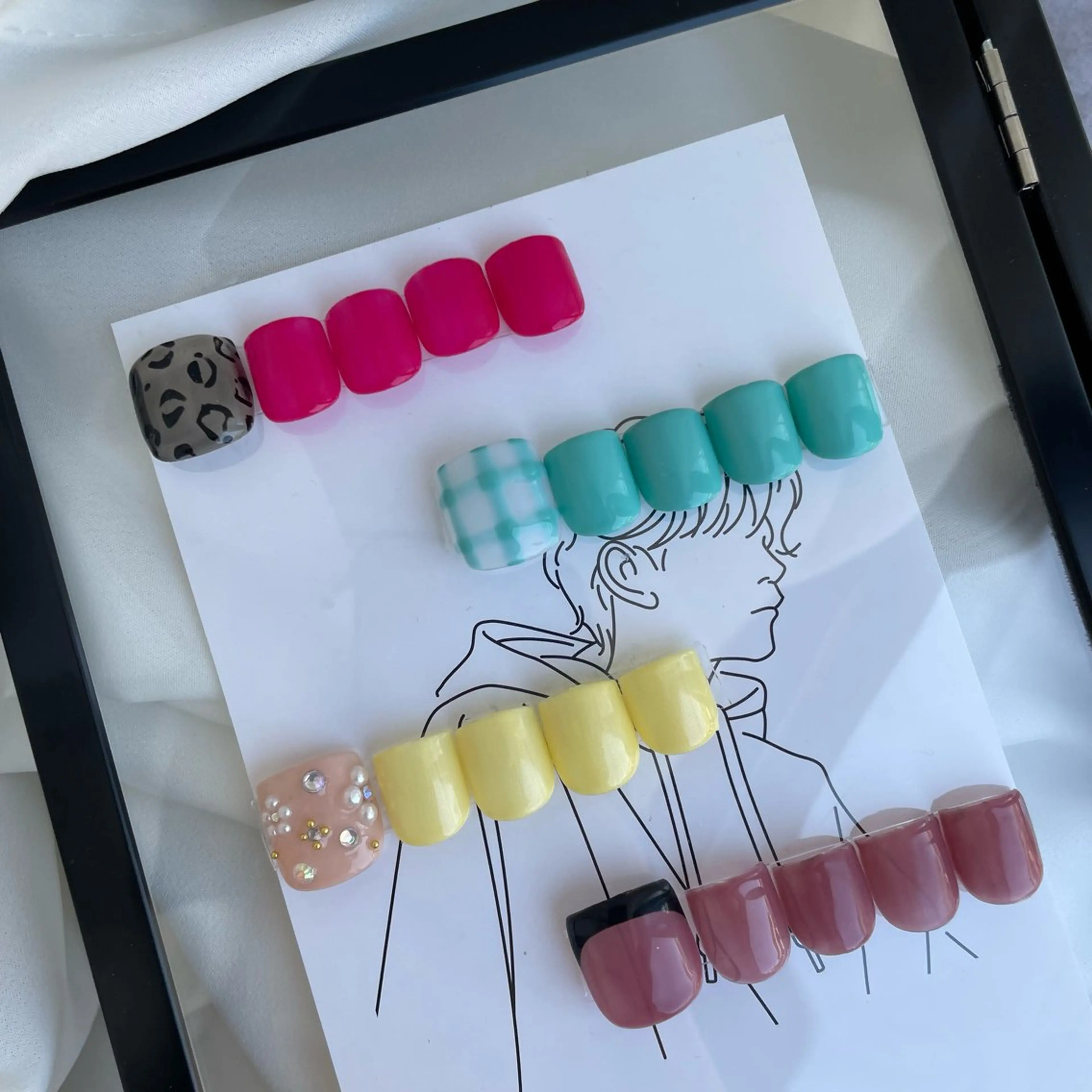 【フットコース人気No.1🐾🤍】親指アートの写真