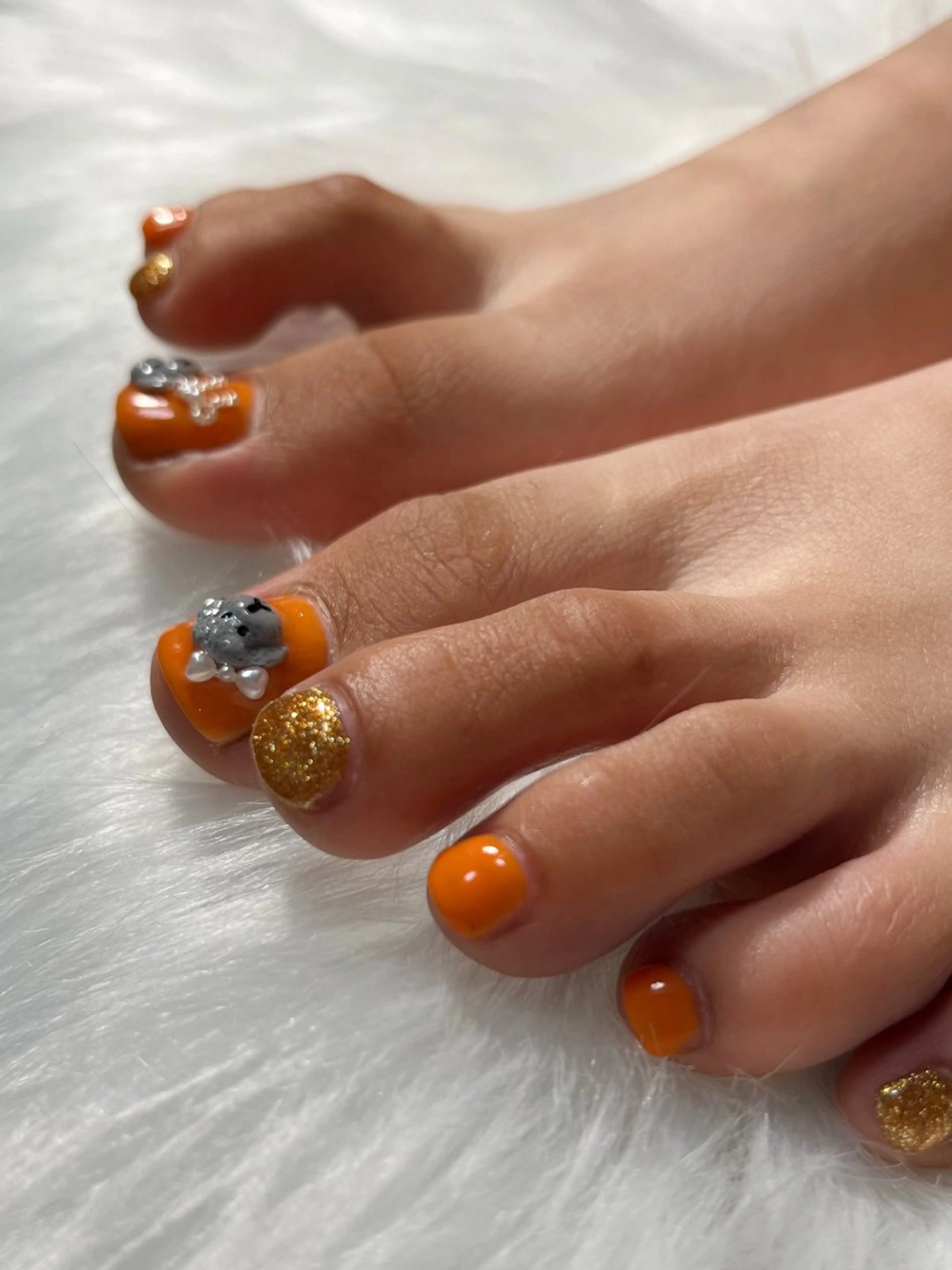 ネイル フットネイル ゴールド オレンジ ぷっくりネイル リボン ハンドネイル Nail salon Hanakoのネイルデザイン