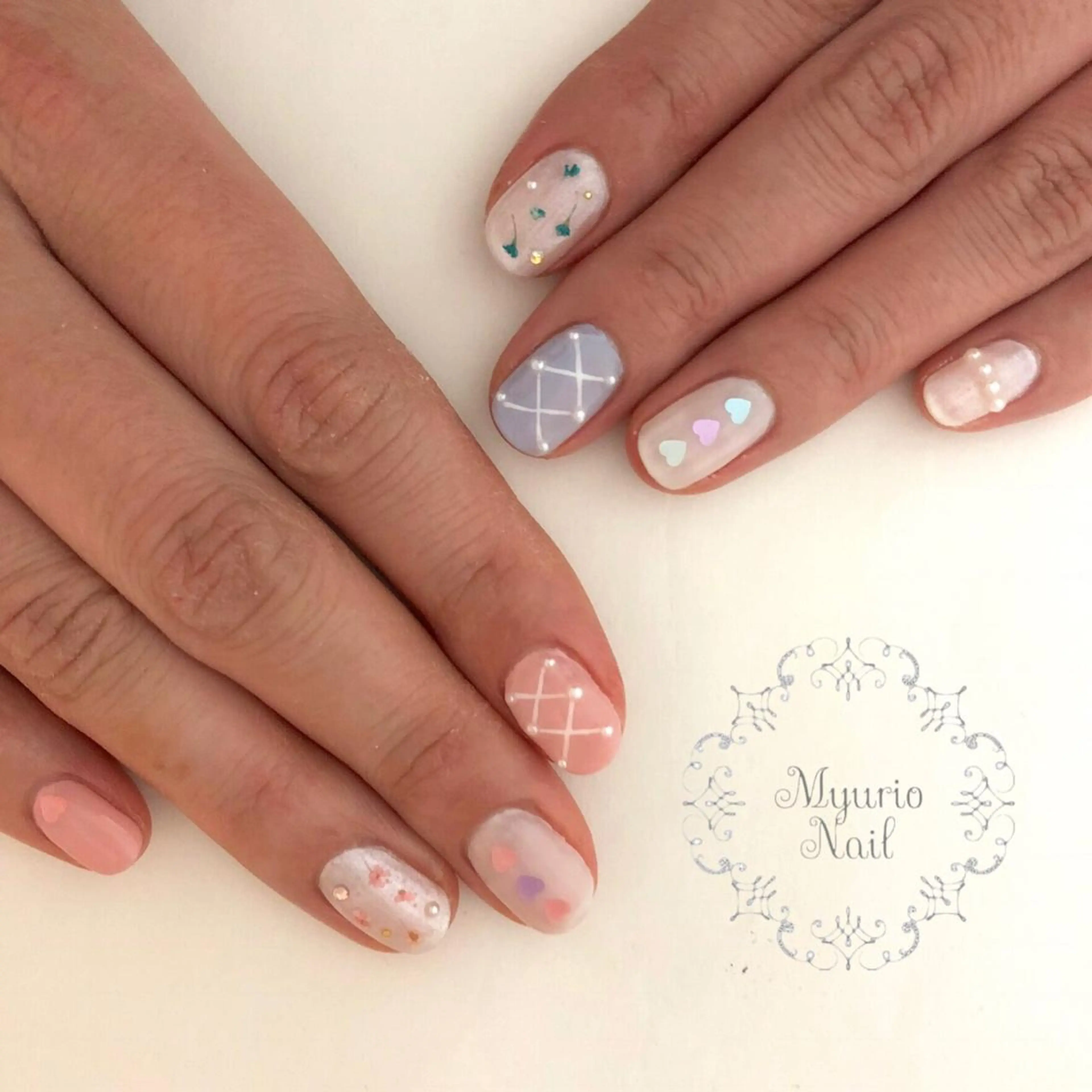 ネイル Sympa 𝓜iwako🐰ᩚのネイルデザイン