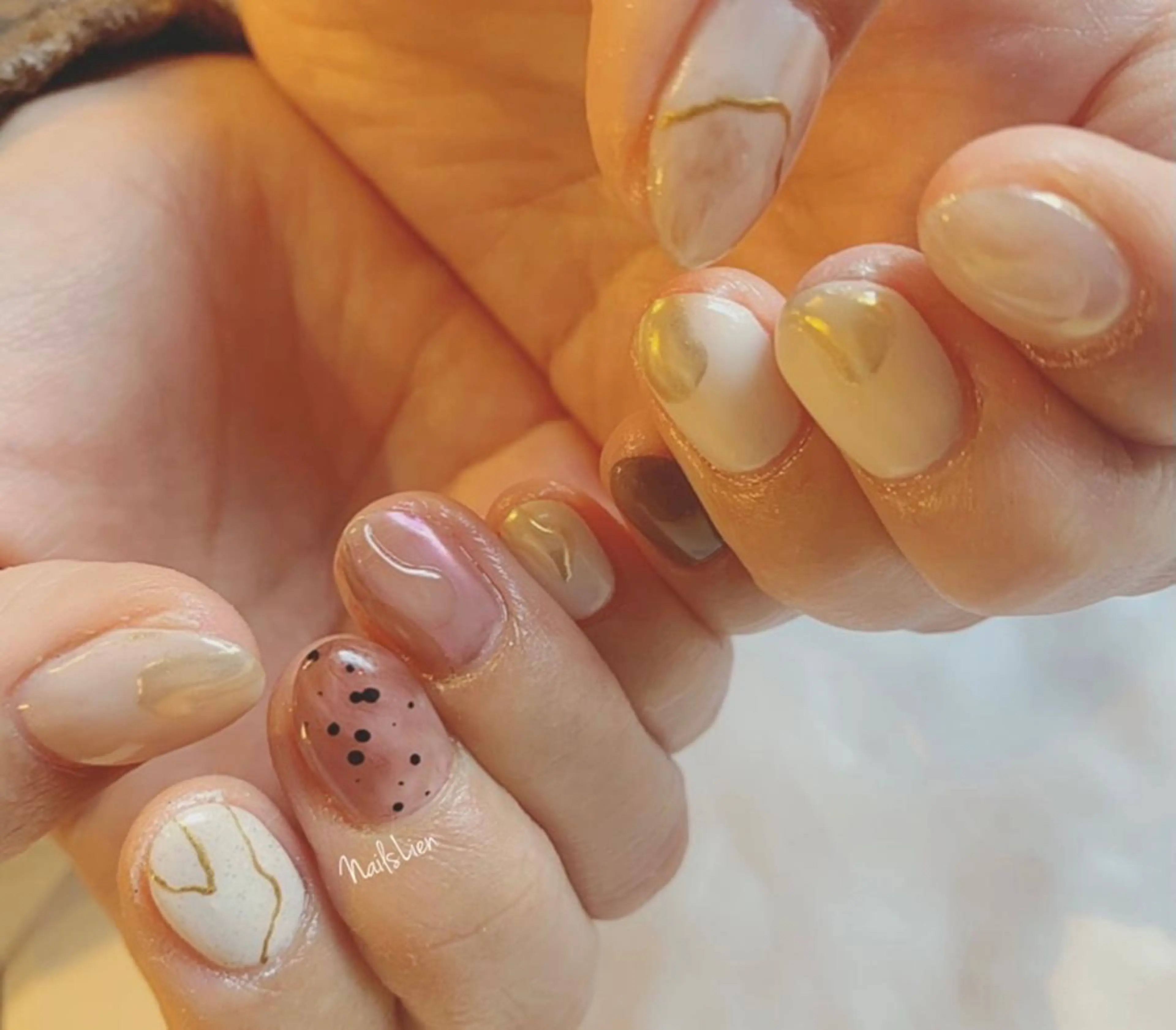 ネイル オーロラネイル クリアネイル ミラーネイル 春ネイル studio e n / RiNのネイルデザイン