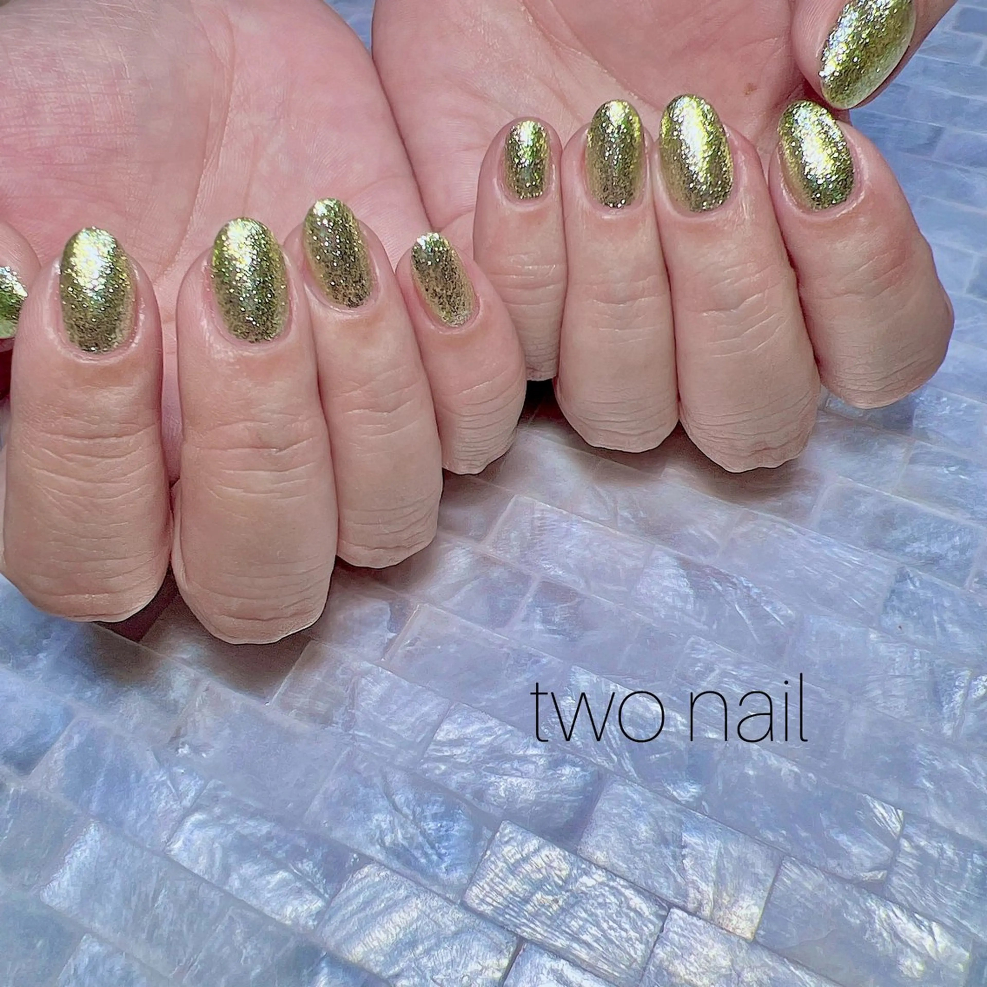 ネイル キラキラネイル ネイルチップ ホワイト ハンドネイル two nailのネイルデザイン