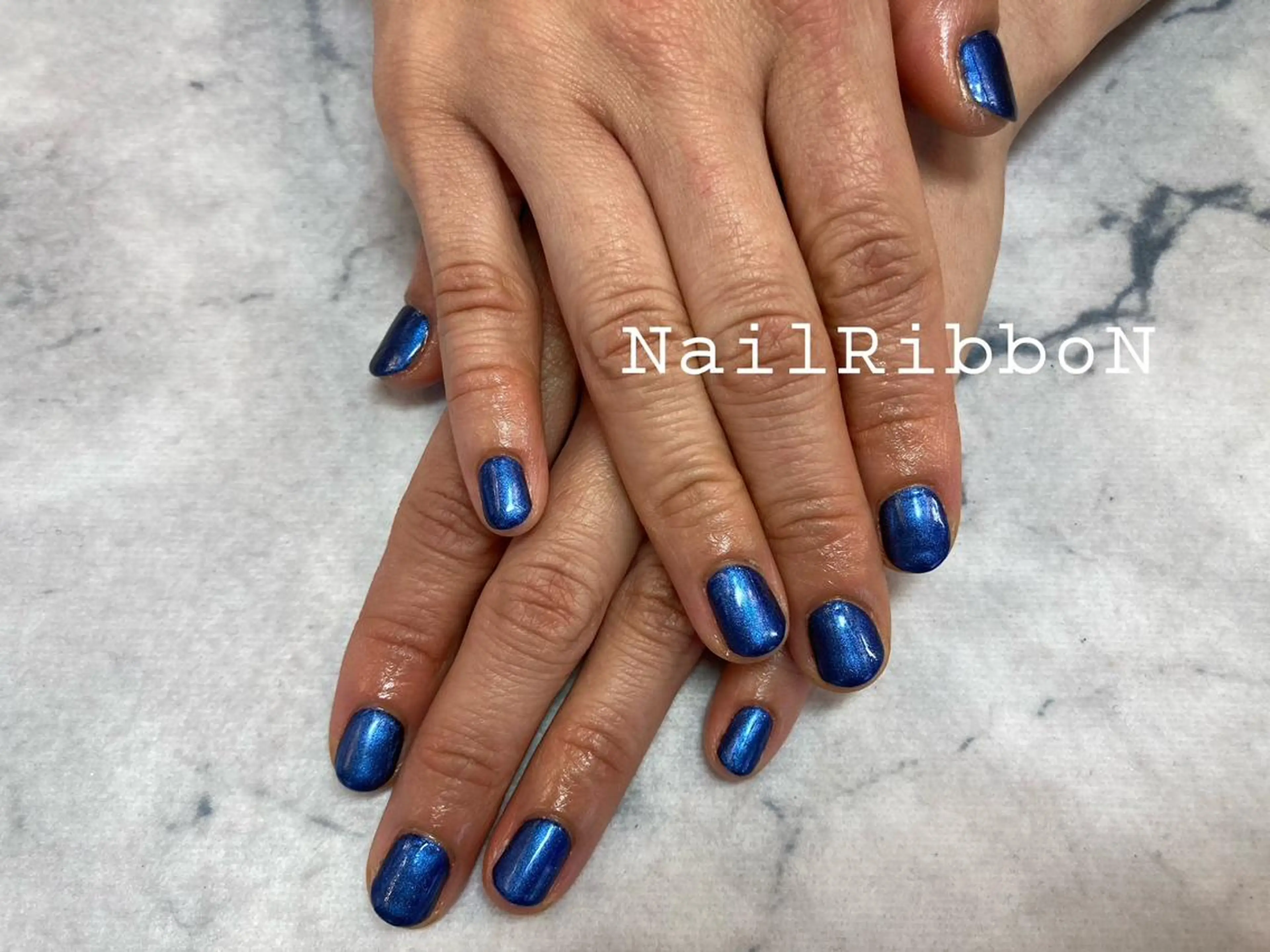 ネイル ネイルリボン 受付スタッフのネイルデザイン