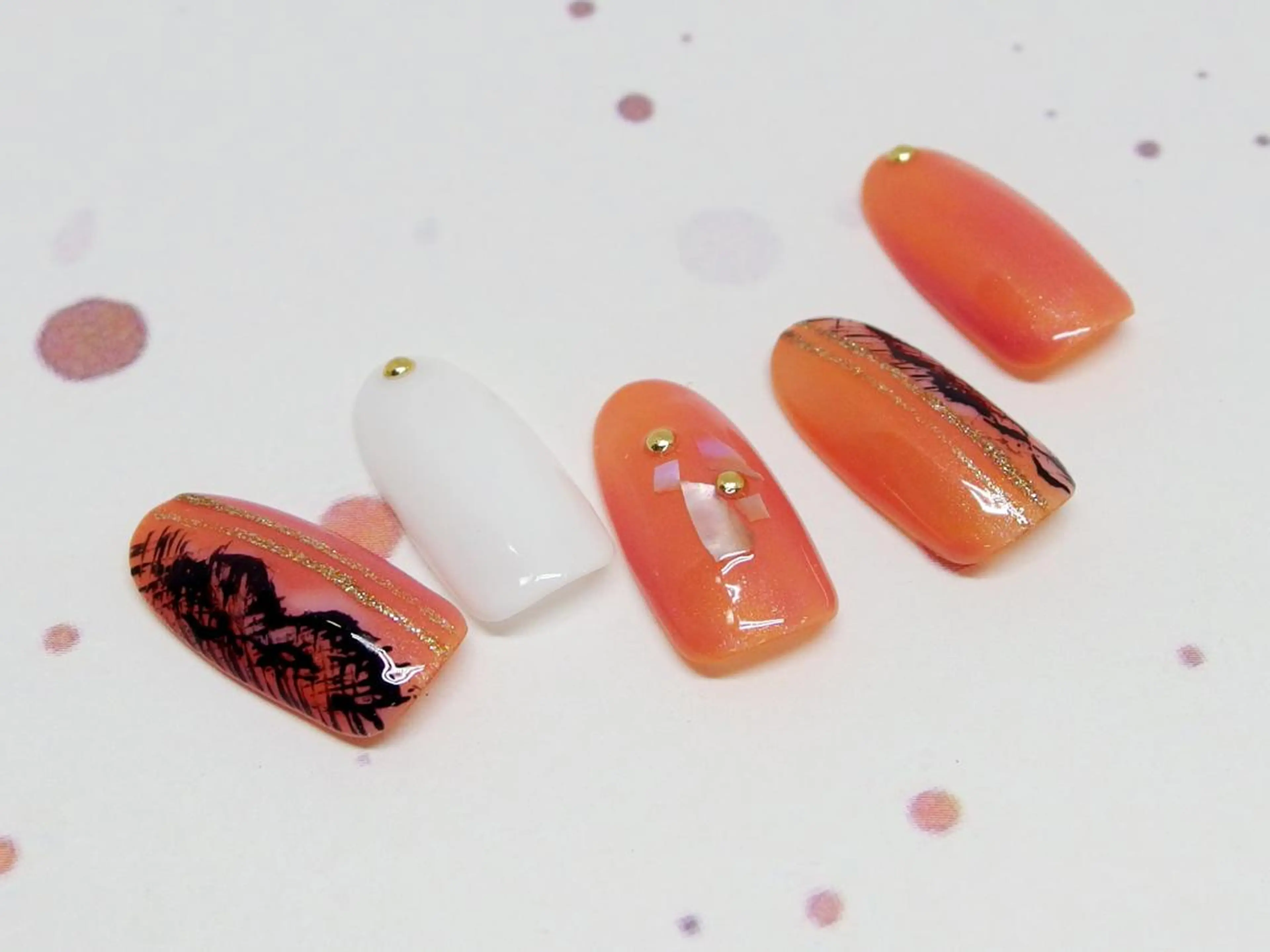 ネイル オレンジ ハンドネイル ティーエヌ 金山駅東口店のネイルデザイン