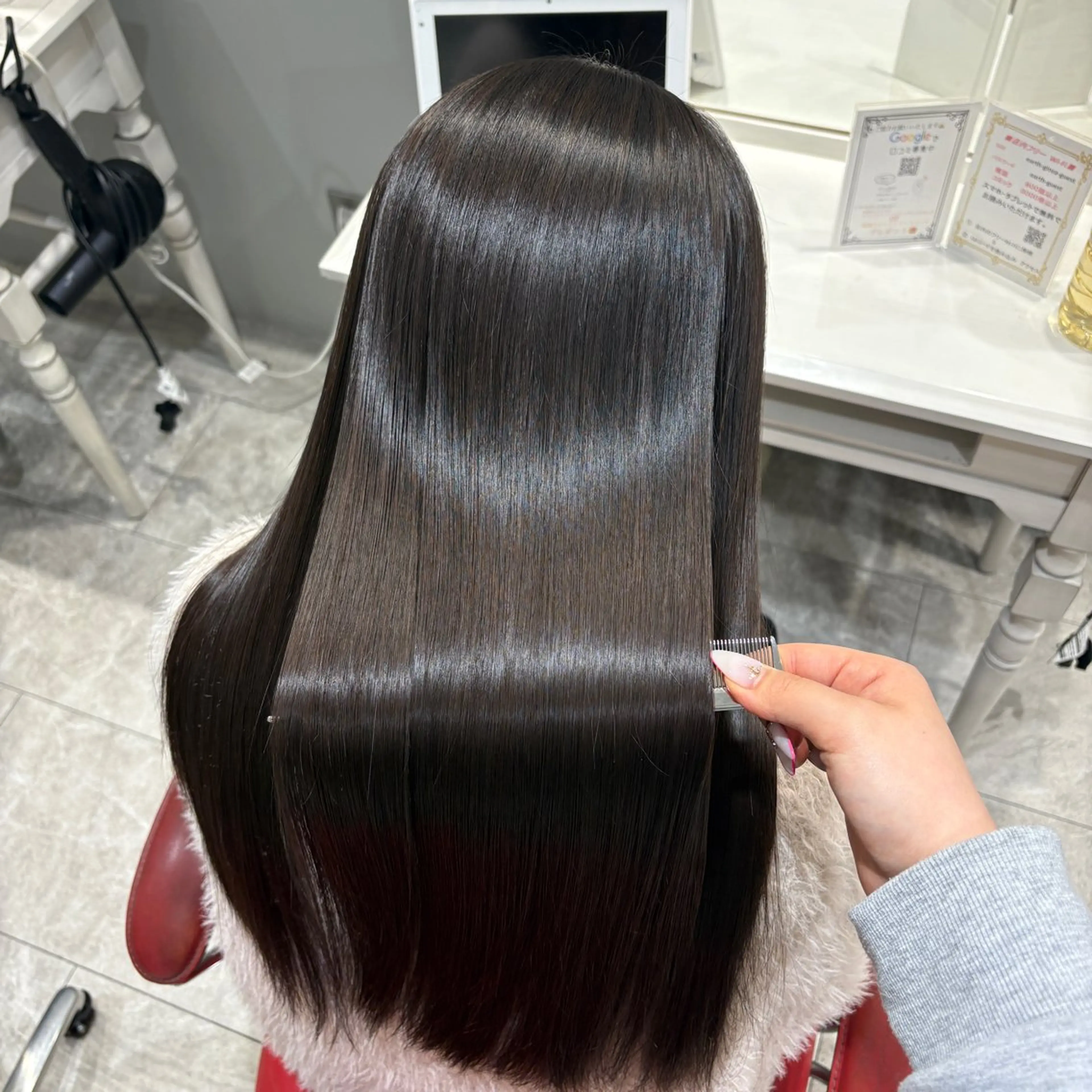 ロング 李 文のヘアスタイル