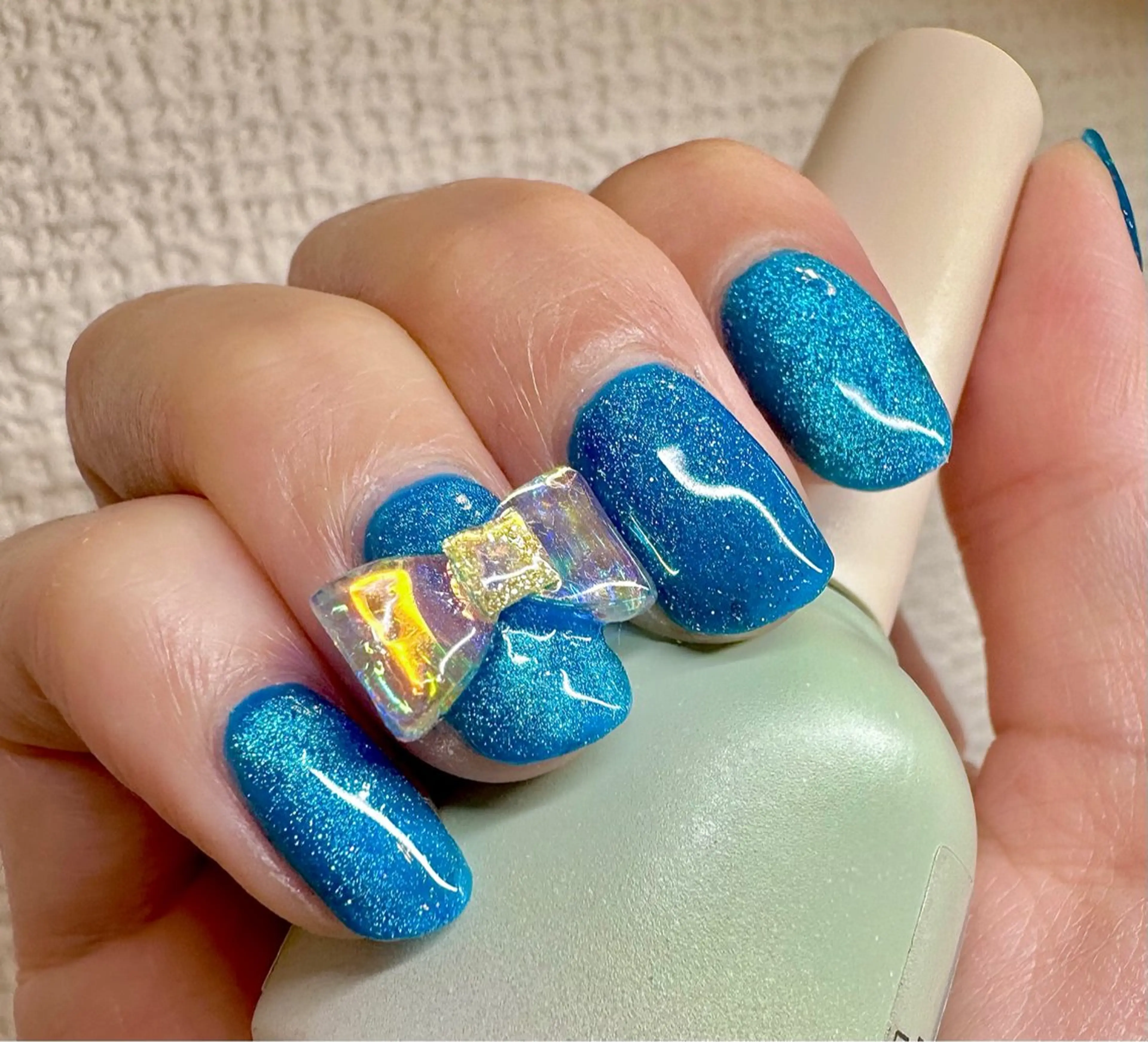 ネイル マグネットネイル リボン m_nail所属・O Mayaのネイルデザイン