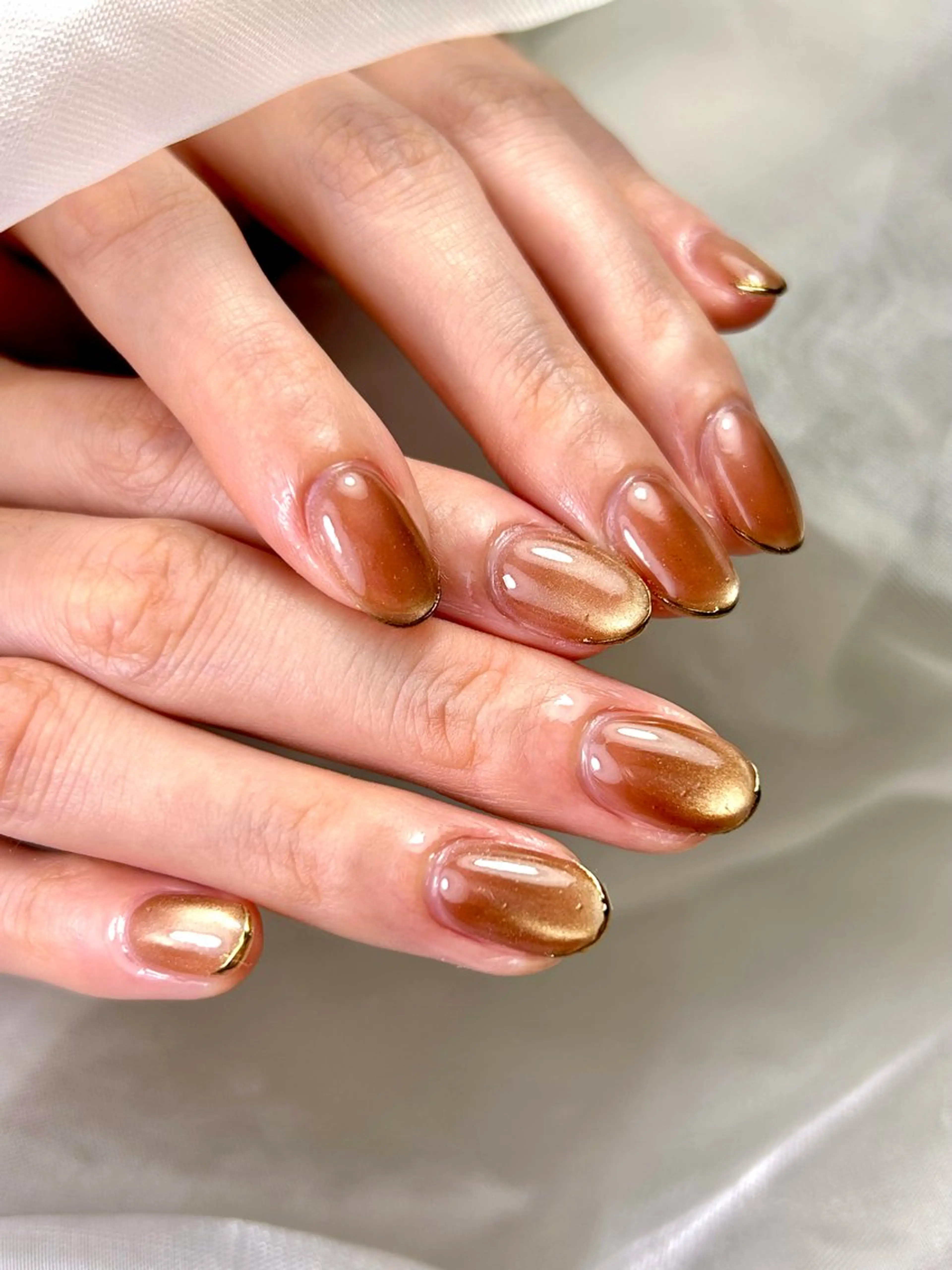 ネイル ブラウン フレンチネイル ゴールド マグネットネイル 冬ネイル ハンドネイル Nailsalon MONA.のネイルデザイン