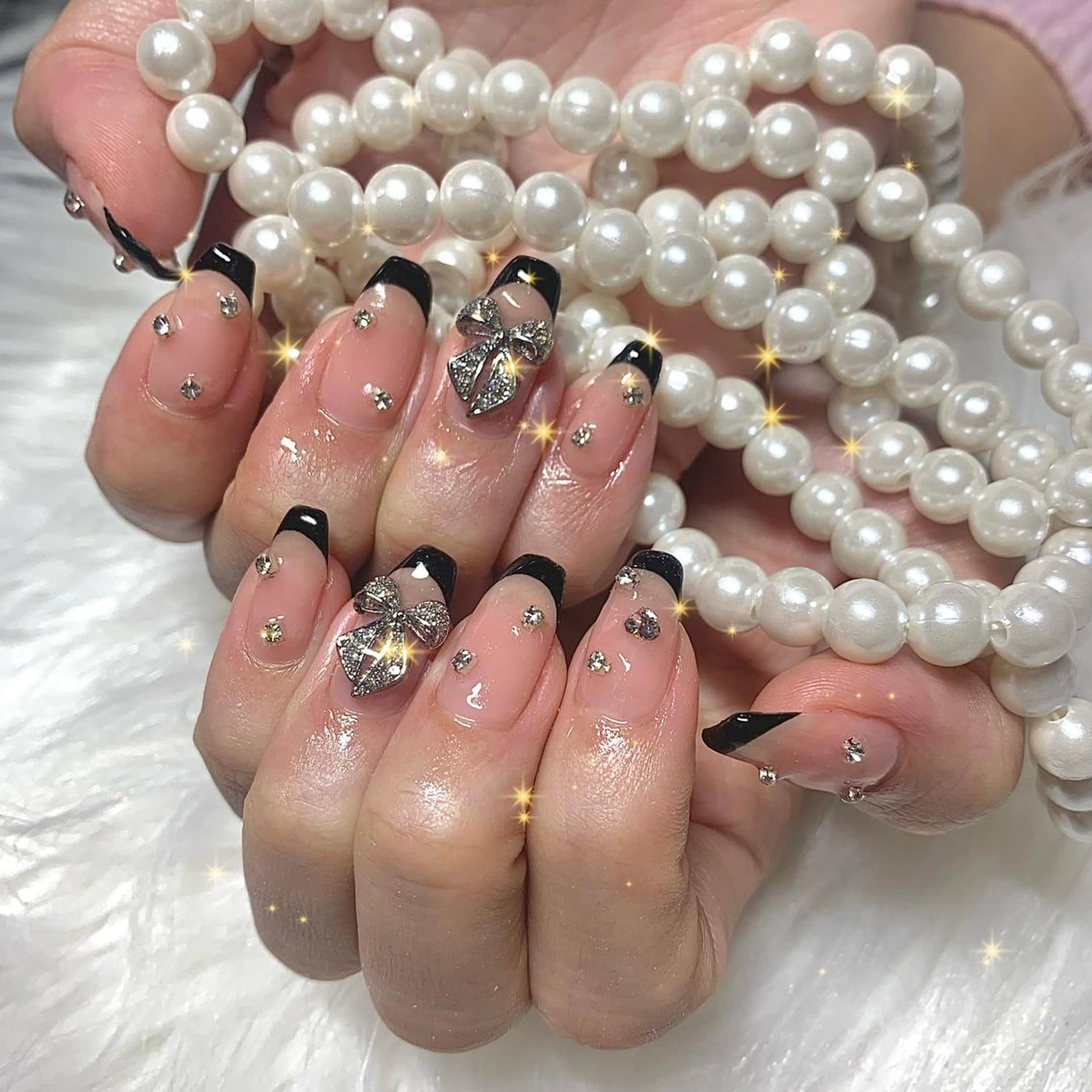 ネイル リボン élu by Noriko 前原のネイルデザイン