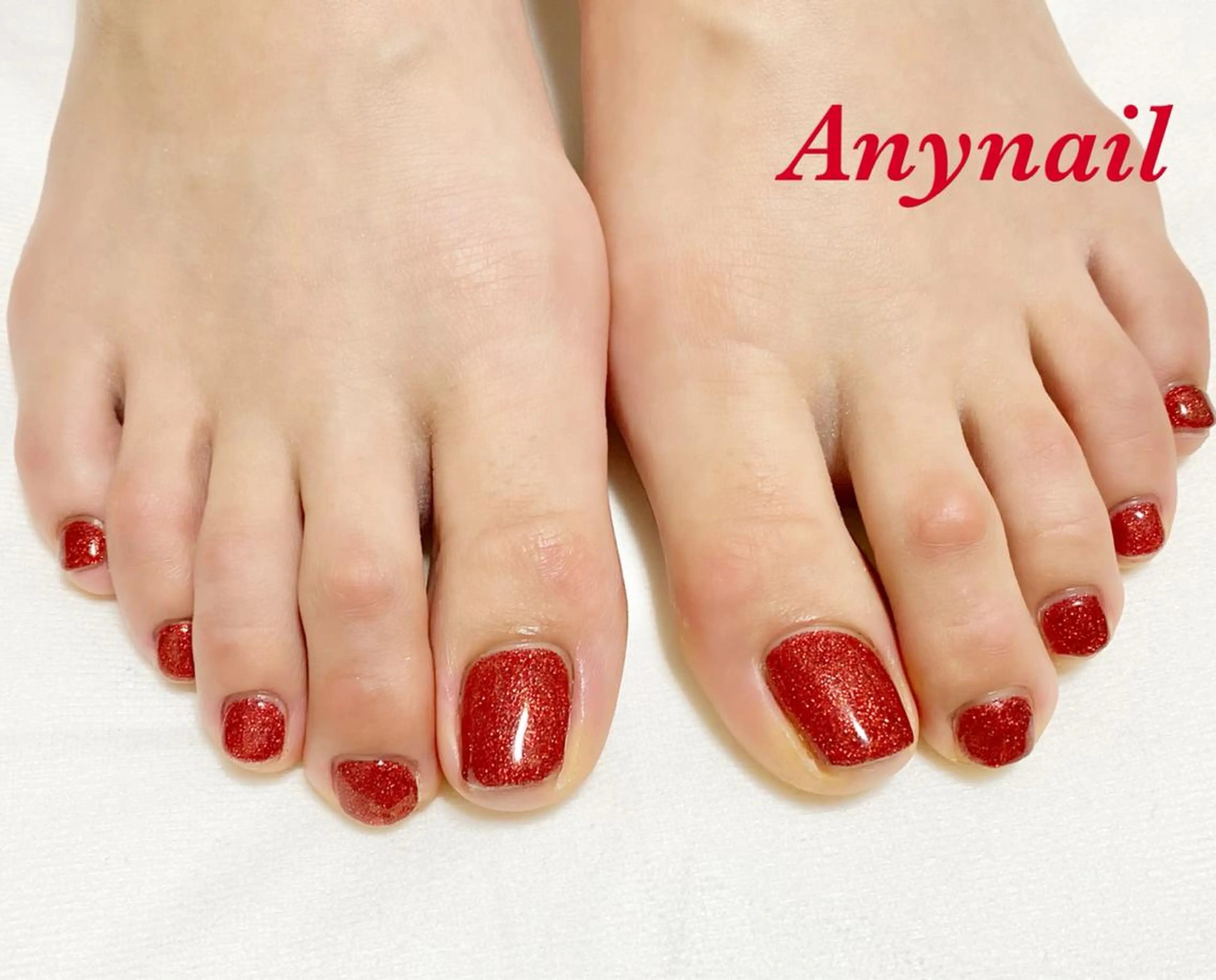 ネイル ブルー フットネイル ラメ(グリッター) ワンカラーネイル 赤色 フットネイル 岩澤 恵子のネイルデザイン