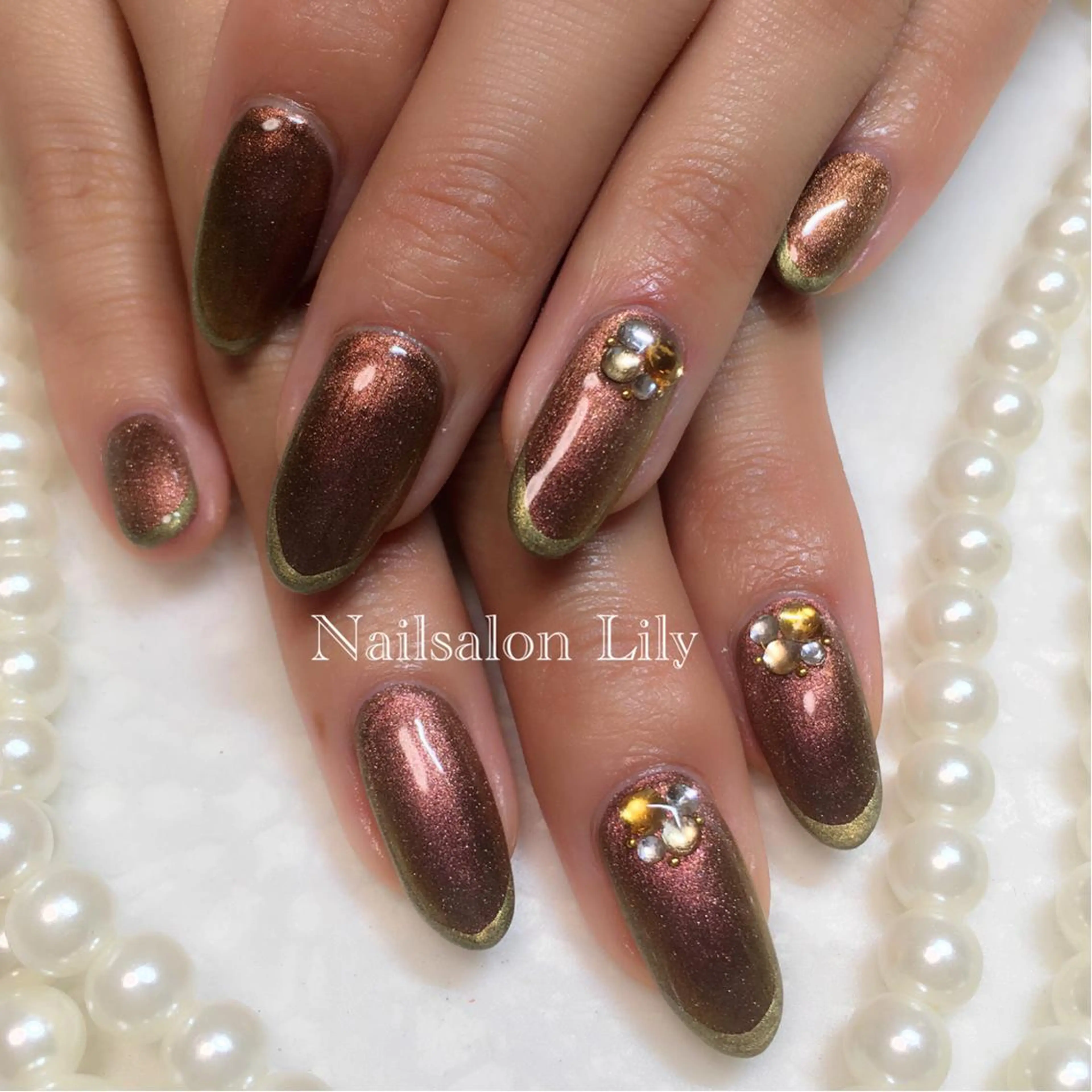 ネイル ブラウン キラキラネイル Nailsalon Lilyのネイルデザイン