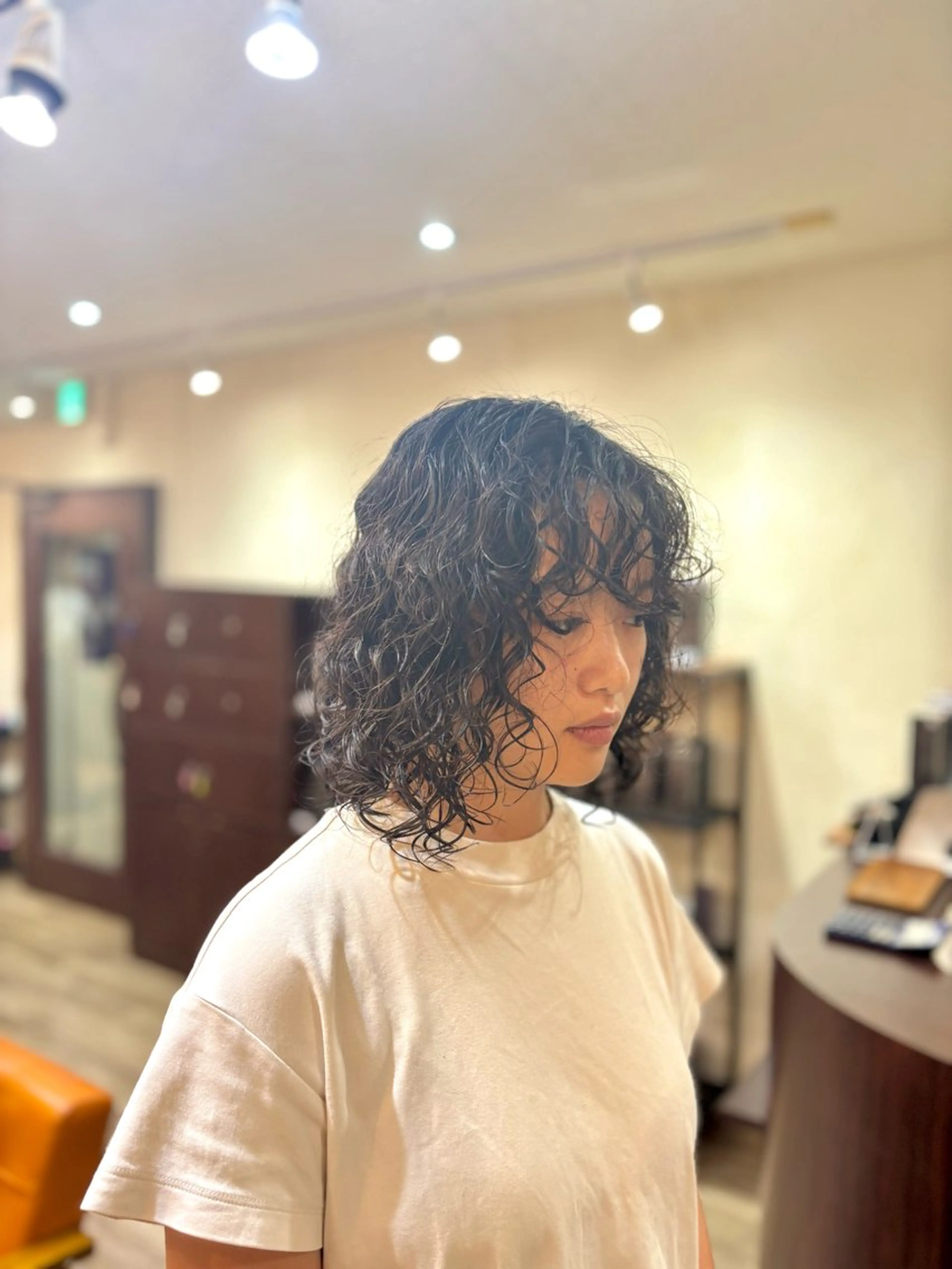 ミディアム パーマ 永作 真司のヘアスタイル