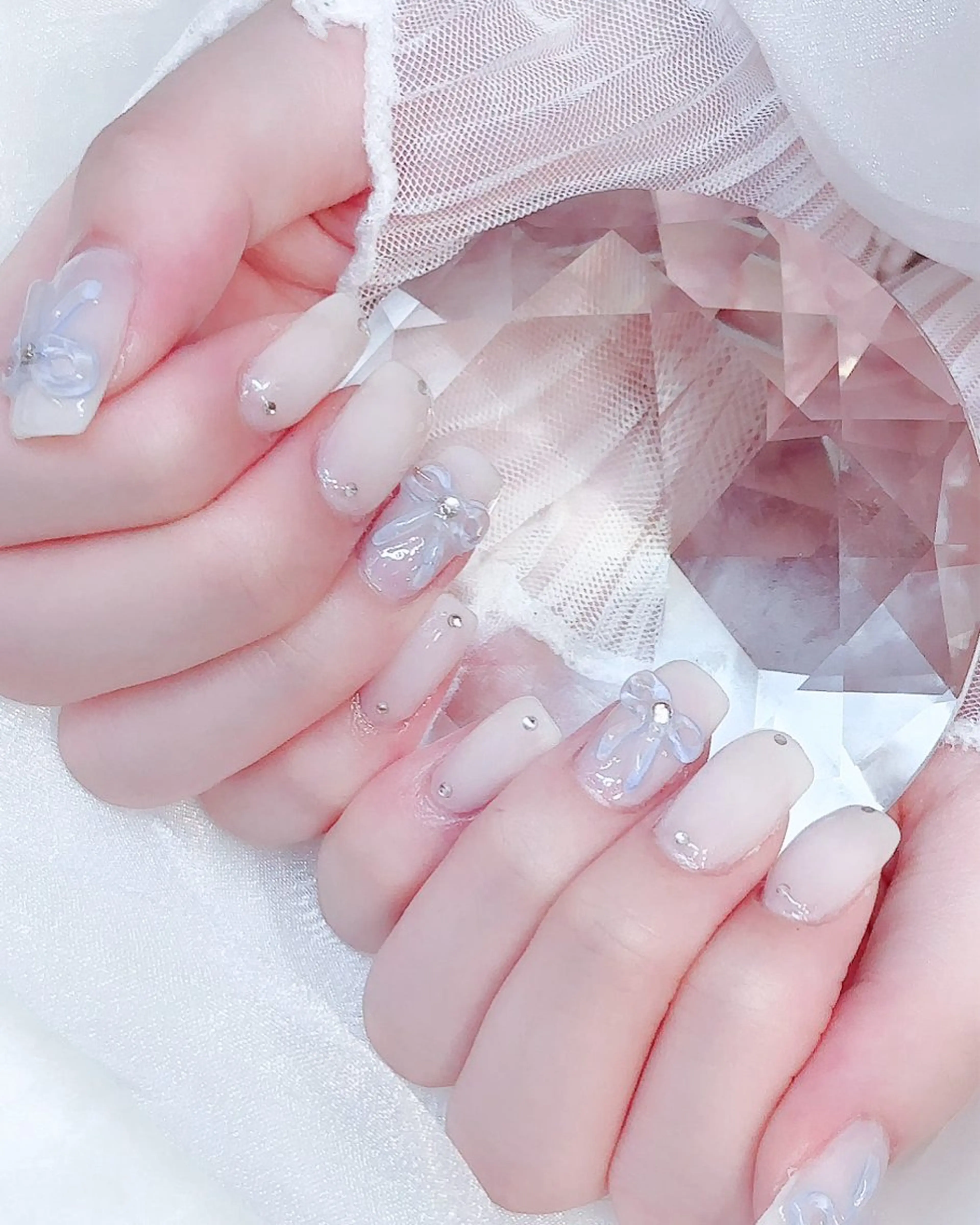 ネイル ジェルネイル キラキラネイル 韓国ネイル ぷっくりネイル リボン Nyanco Nailのネイルデザイン