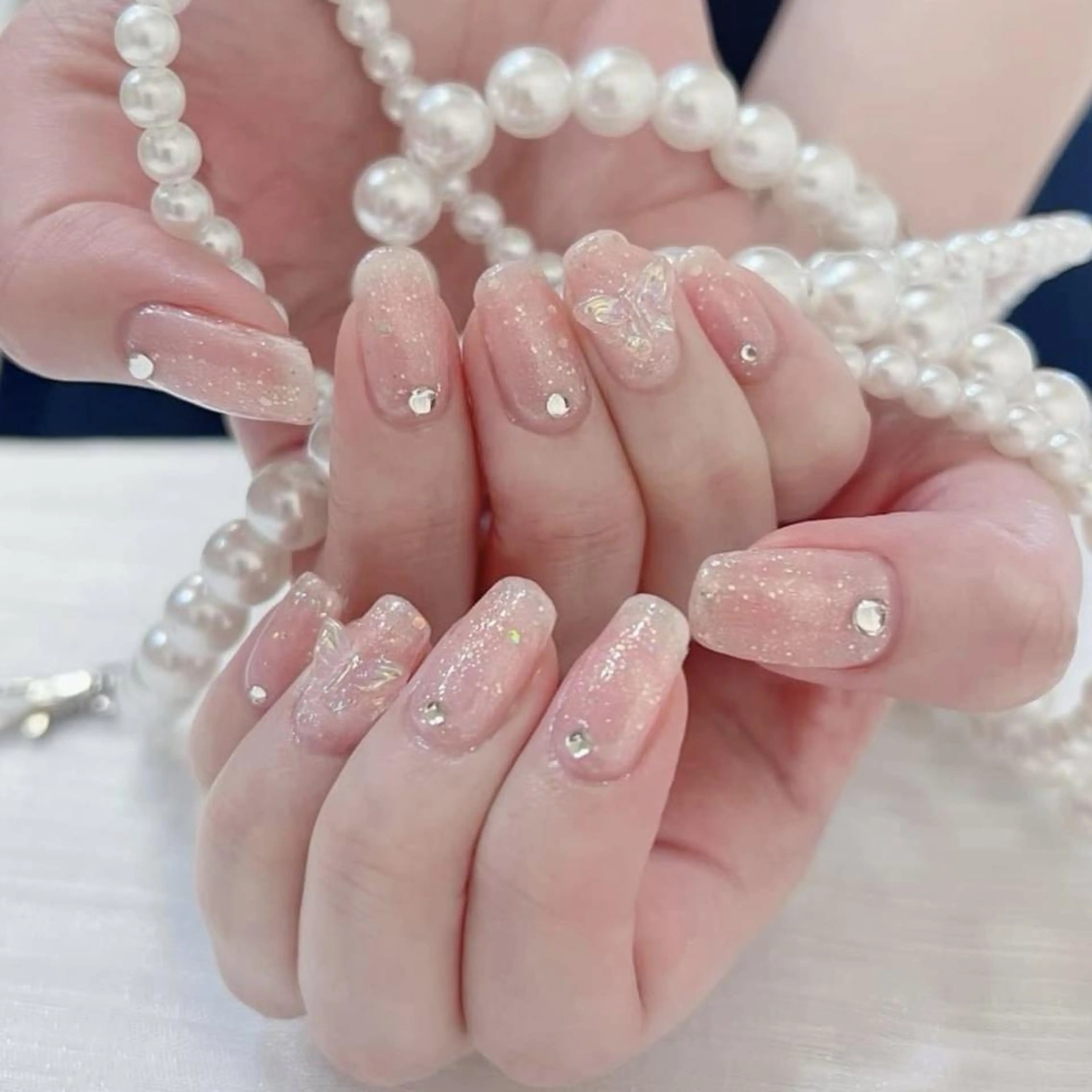 ネイル RAFFINE 月🦋🩵のネイルデザイン