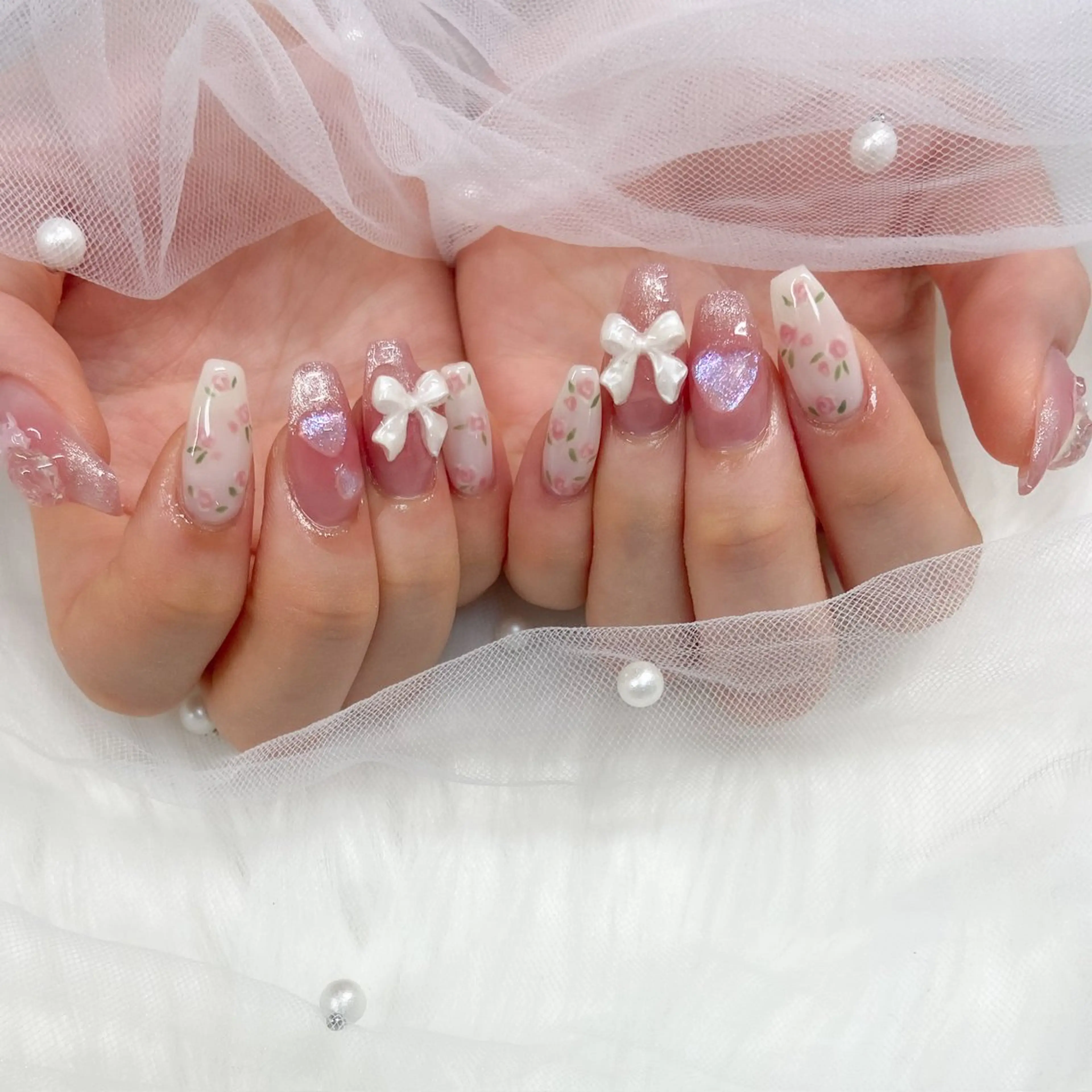 ネイル ガーリー ハート キラキラネイル ピンク リボン ハンドネイル べルミエール sakiのネイルデザイン