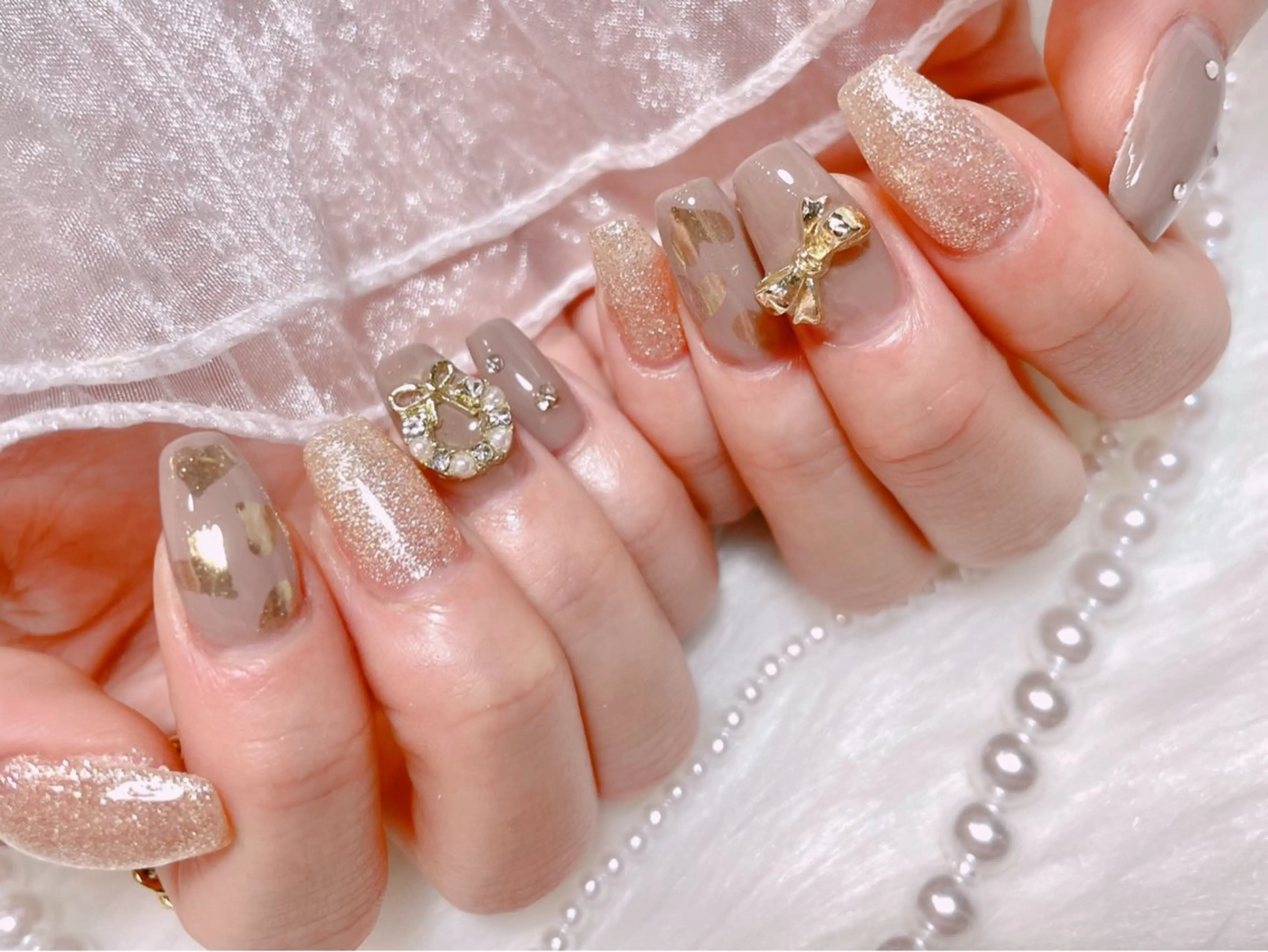 ネイル ジェルネイル ゴールド パラジェル リボン 冬ネイル ハンドネイル ゆりか ジョアアンジェ福島のネイルデザイン