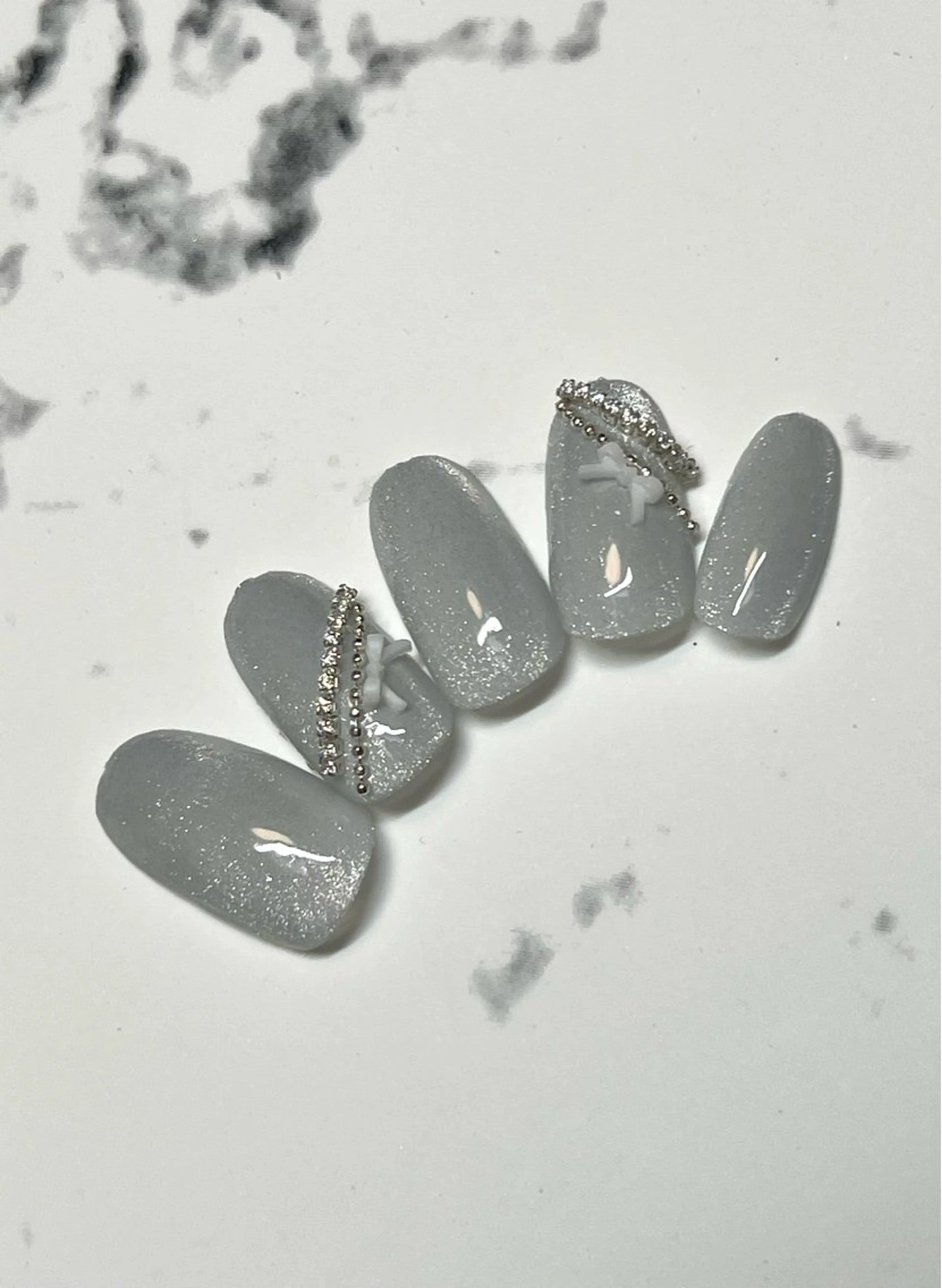 ラインストーンにリボン🎀の写真