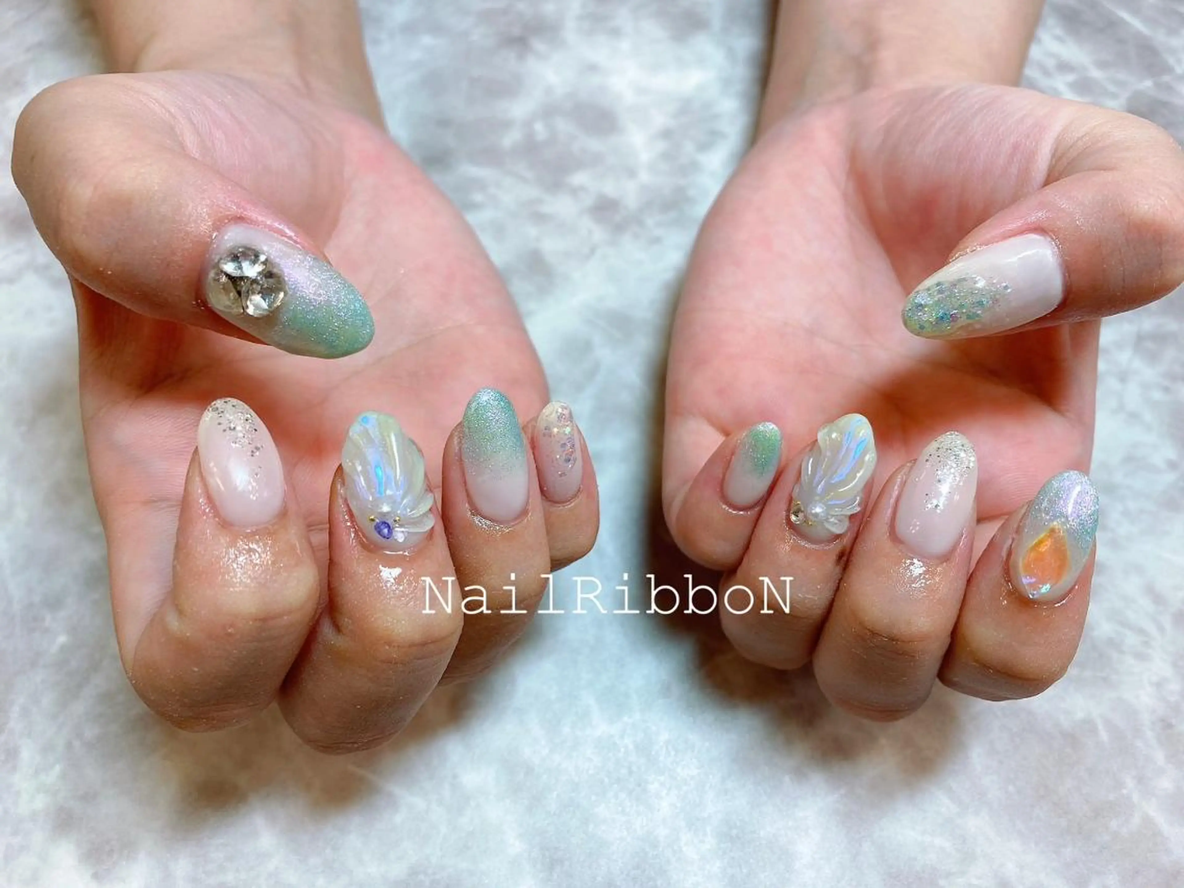ネイル ネイルリボン 受付スタッフのネイルデザイン
