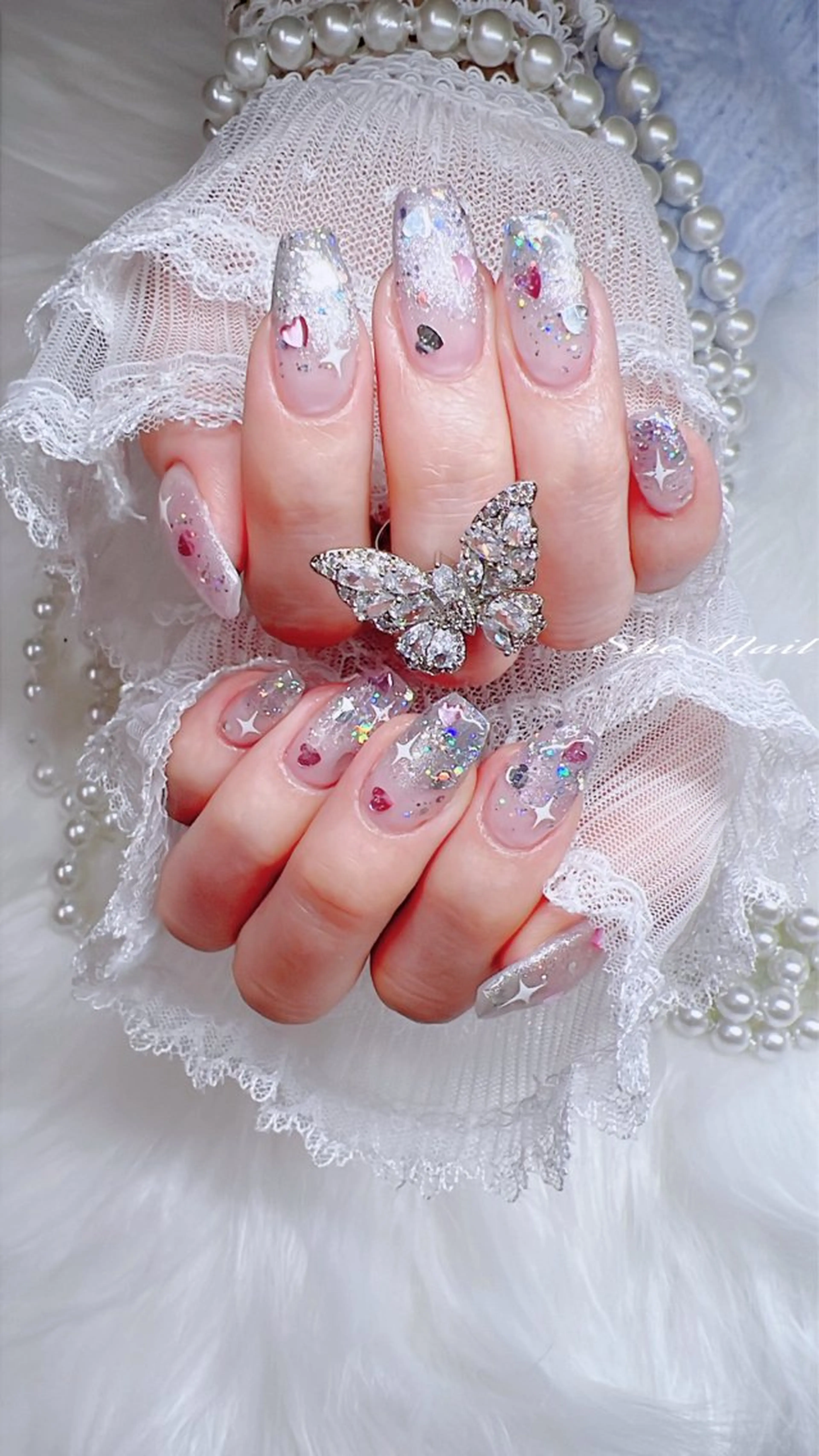 ネイル チークネイル 成人式 長さ出し フレンチネイル キラキラネイル ハンドネイル She   Nail所属・ISA_ BELLAのネイルデザイン