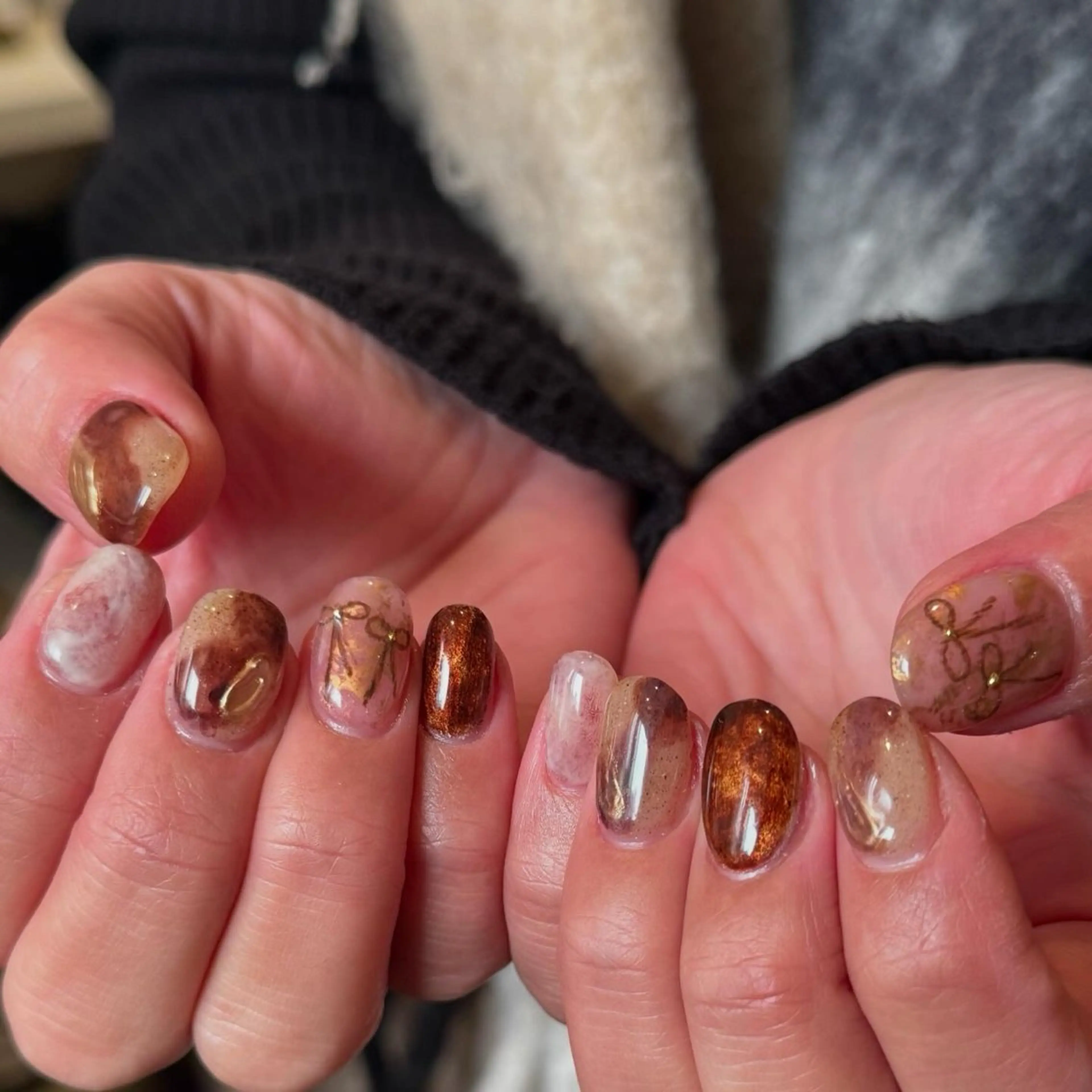 ネイル ブラウン ニュアンスネイル リボン Yu_me(ユーミー)所属・Yu_me fuukaのネイルデザイン