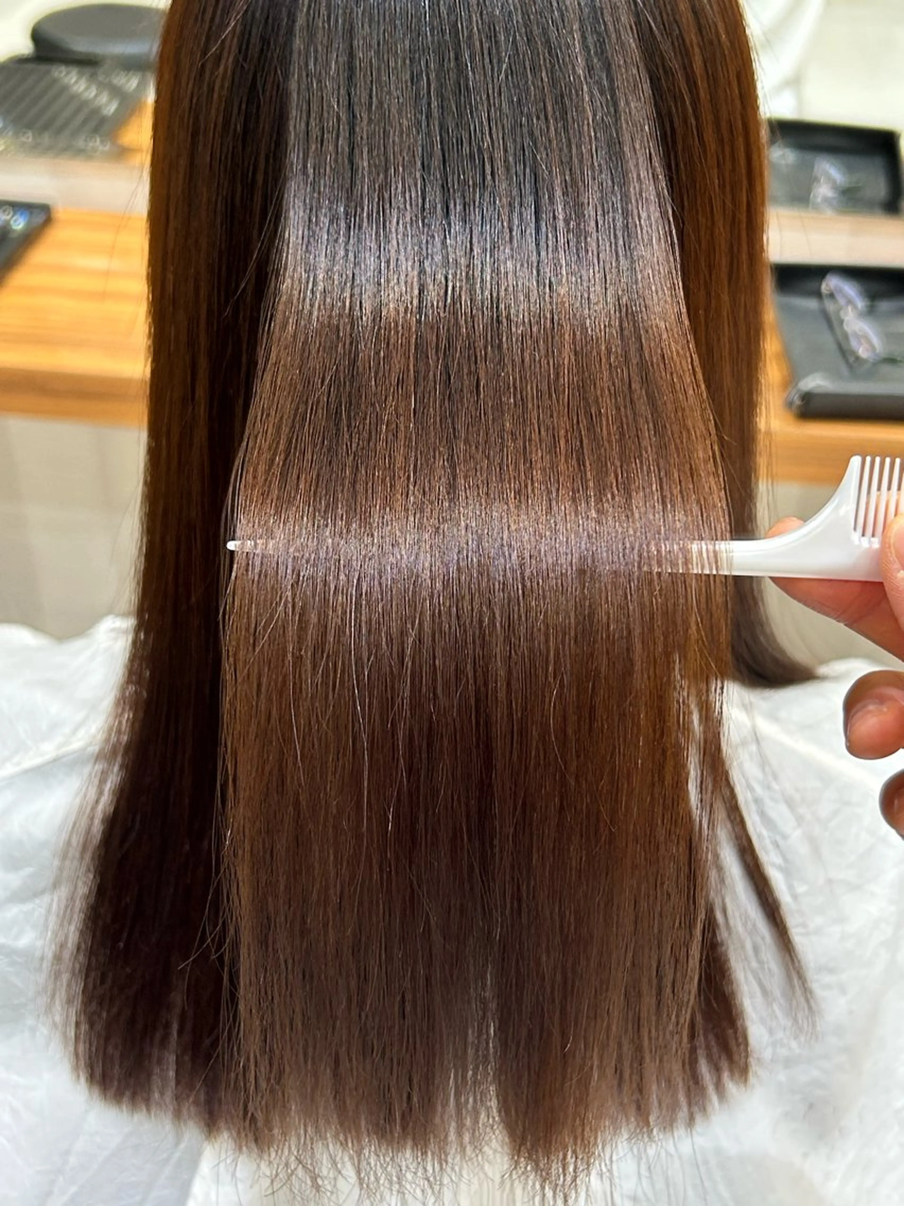 ロング 縮毛矯正 日置美容室所属・石井 佑飛のヘアスタイル