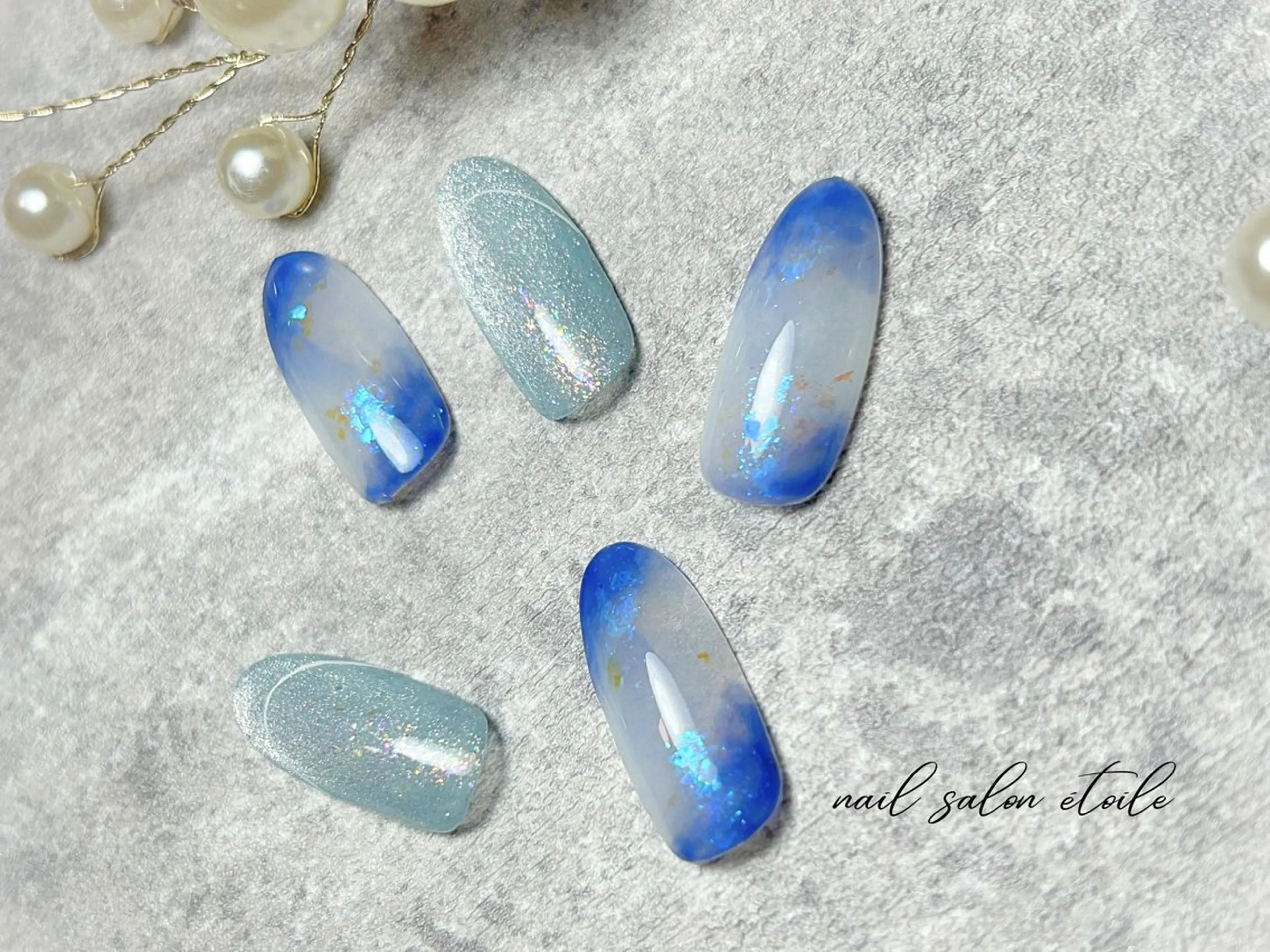 ネイル ブルー キラキラネイル 水色 マグネットネイル ニュアンスネイル ハンドネイル nail salon étoileのネイルデザイン