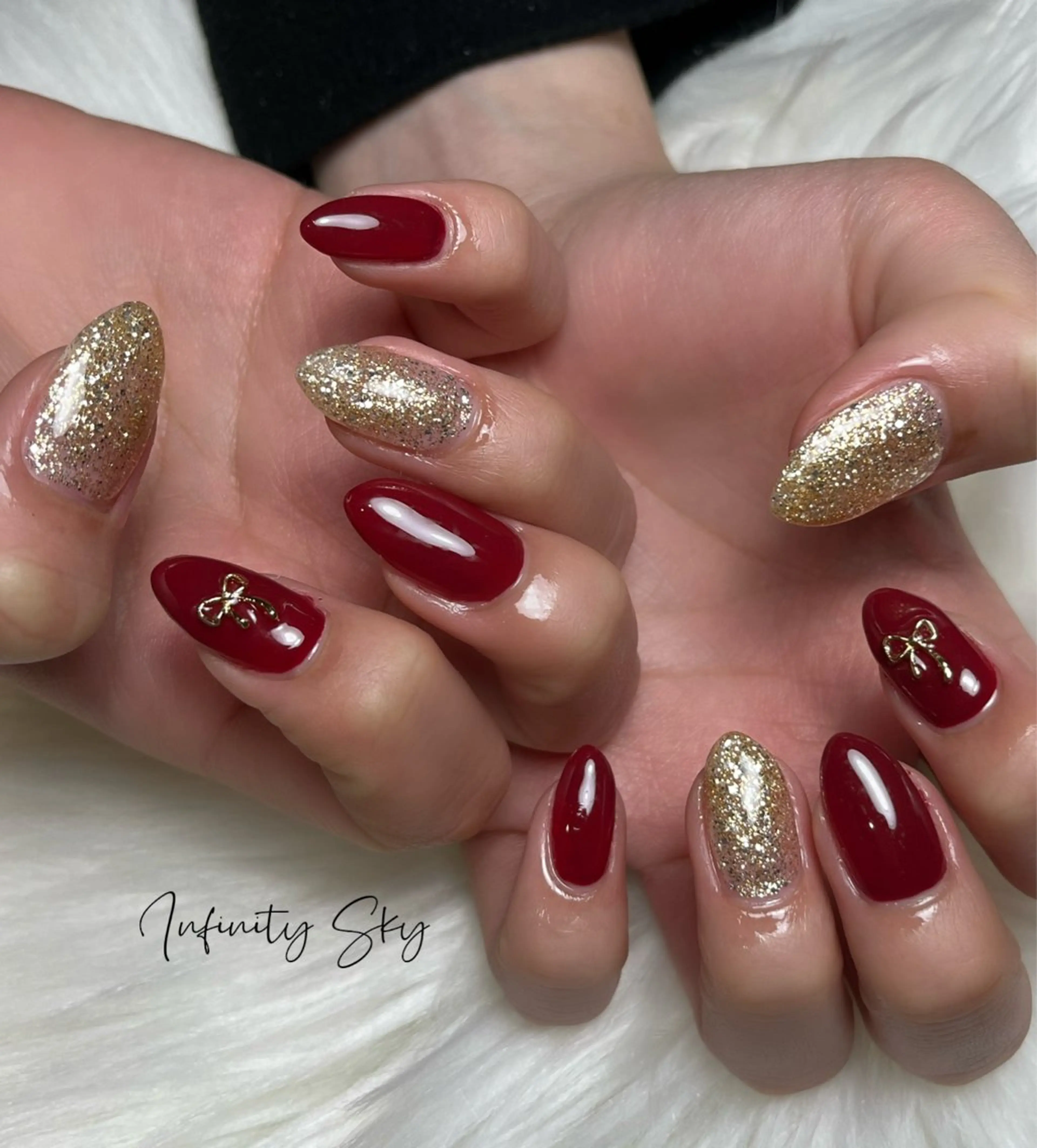 ネイル 赤色 リボン 冬ネイル クリスマス infinity skyのネイルデザイン