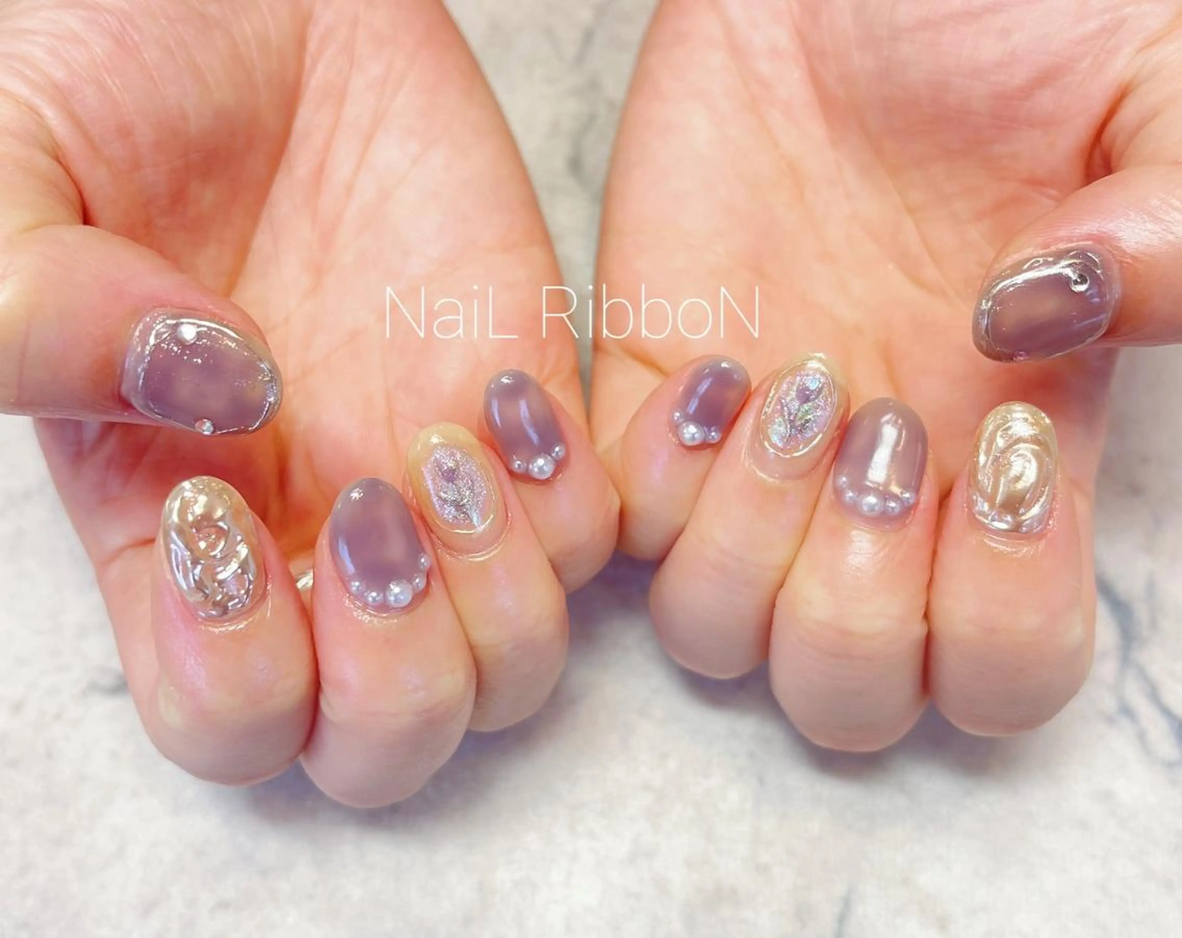 ネイル ネイルリボン 受付スタッフのネイルデザイン