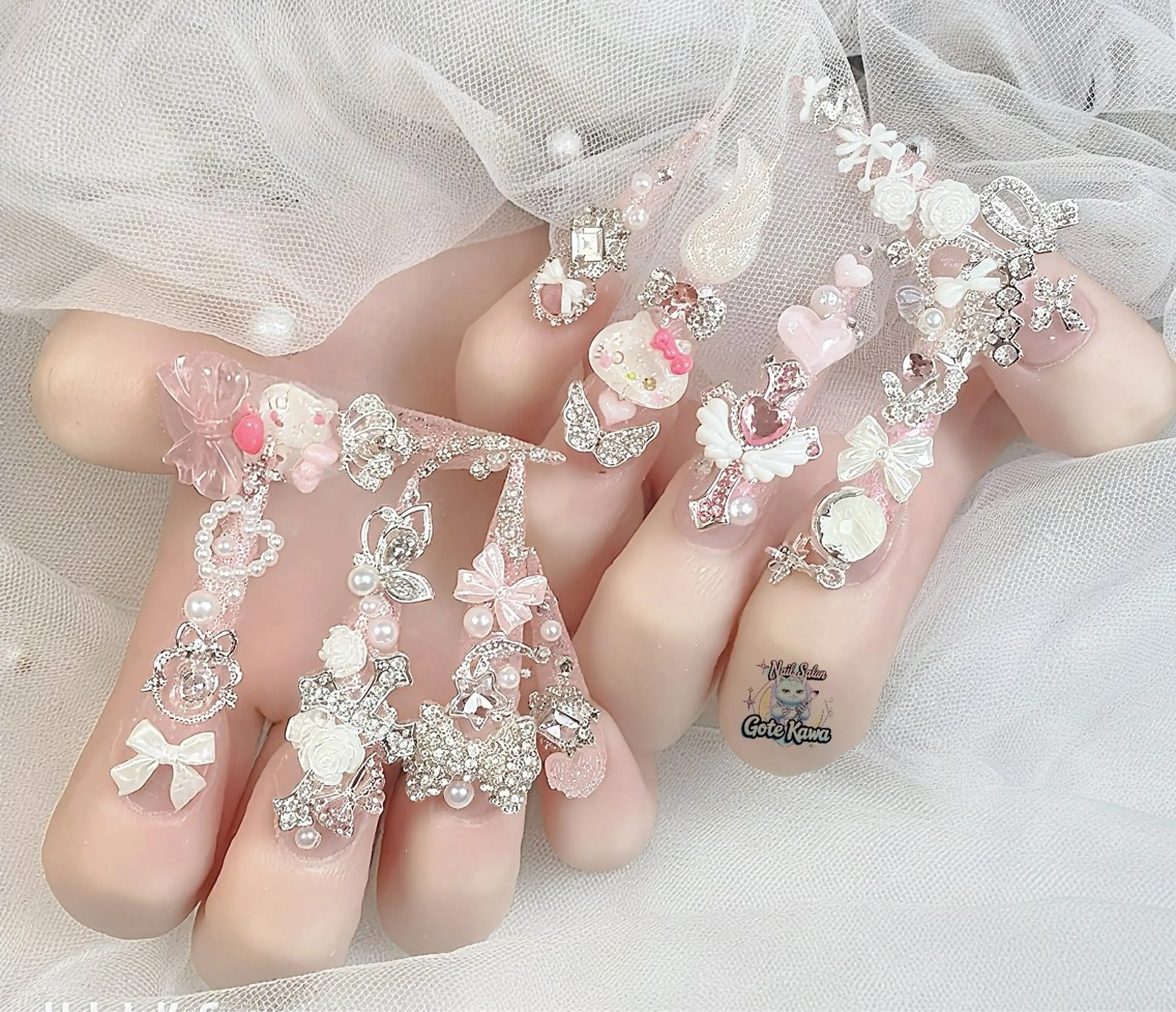 ネイル キラキラネイル ロングネイル 春ネイル スーパーロングネイル ハンドネイル ハンドケア GOTE KAWA Nail Salon(ゴテかわ)所属・Gote Kawa nail salonのネイルデザイン