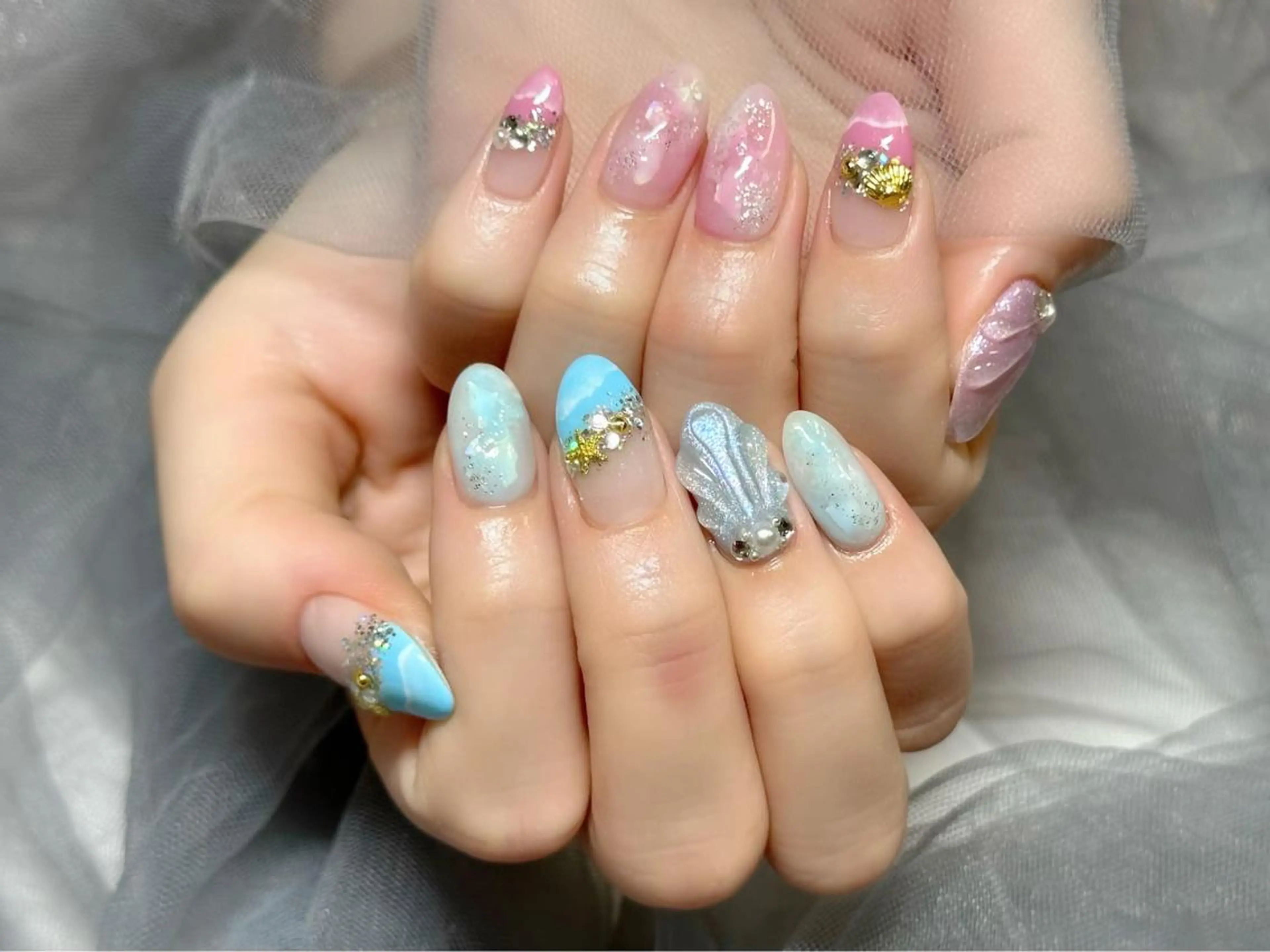 ネイル 水色 ピンク ハンドネイル KURELLY所属・Nail Salon KURELLYのネイルデザイン