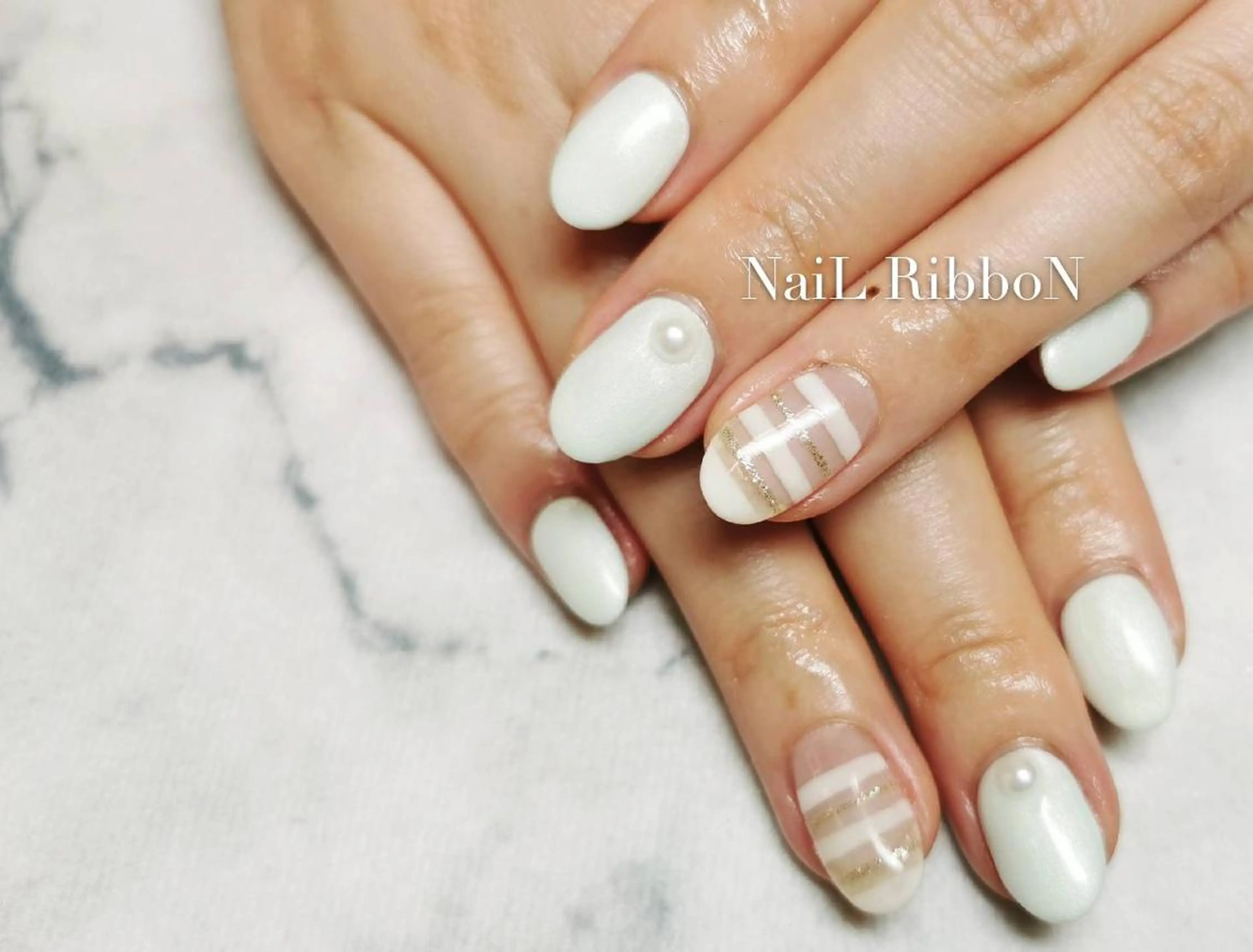 ネイル ネイルリボン 受付スタッフのネイルデザイン
