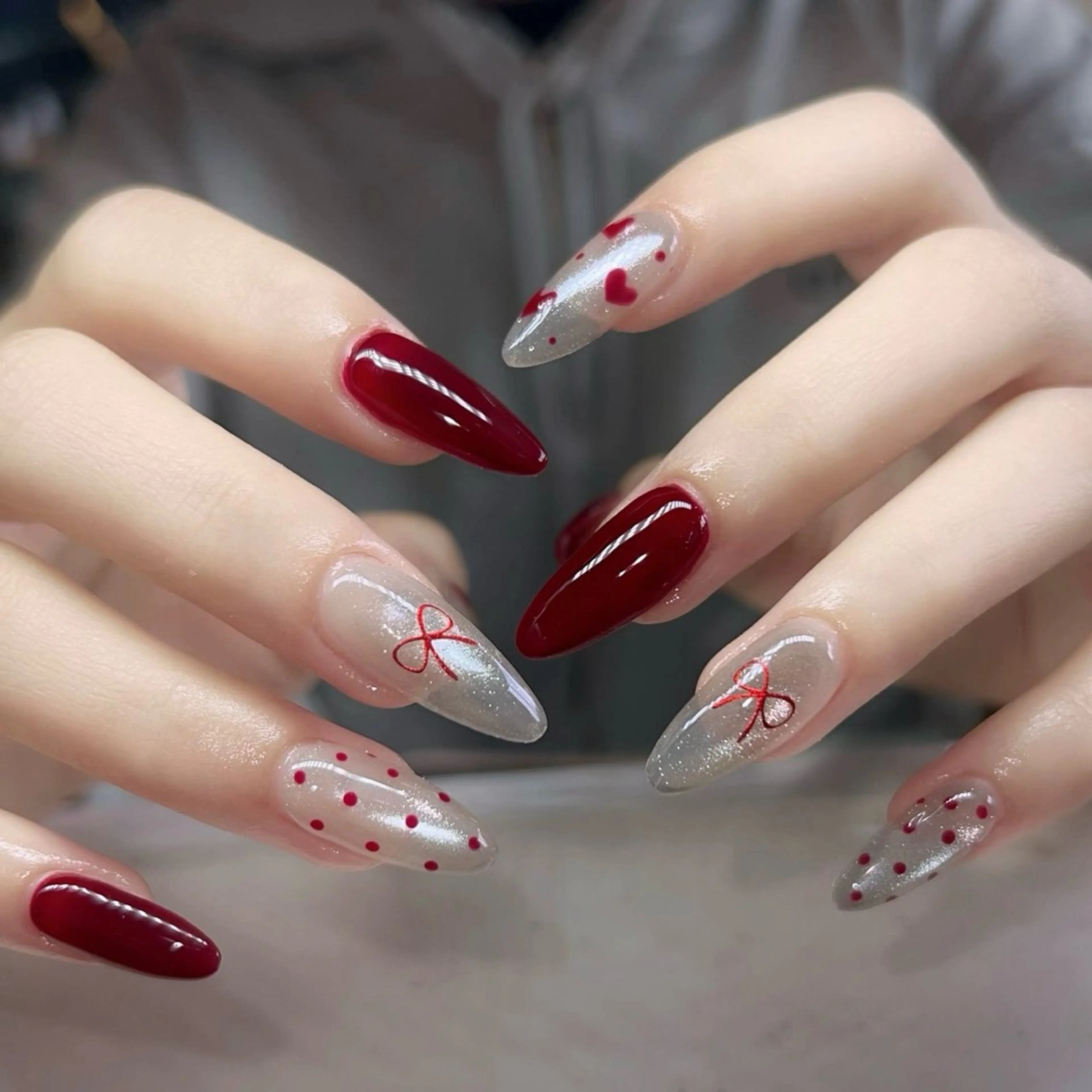 チップ長さ出しジェル2色・マグネット・デザイン ¥4000ロング +¥500の写真