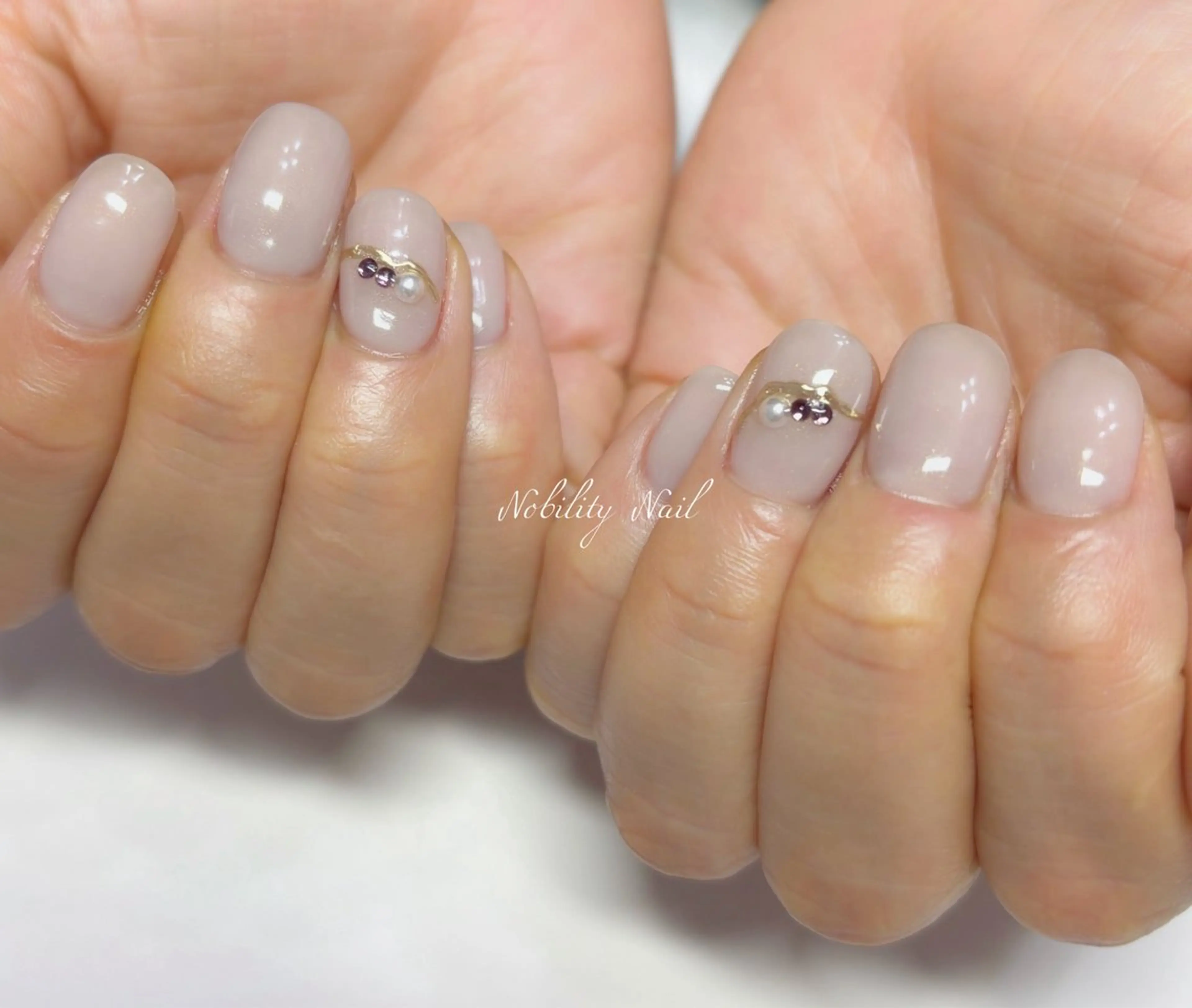 ネイル アートネイル キラキラネイル ミラーネイル パープル ストーンネイル ネイルサロンNobilityNail所属・風口 麻由子のネイルデザイン