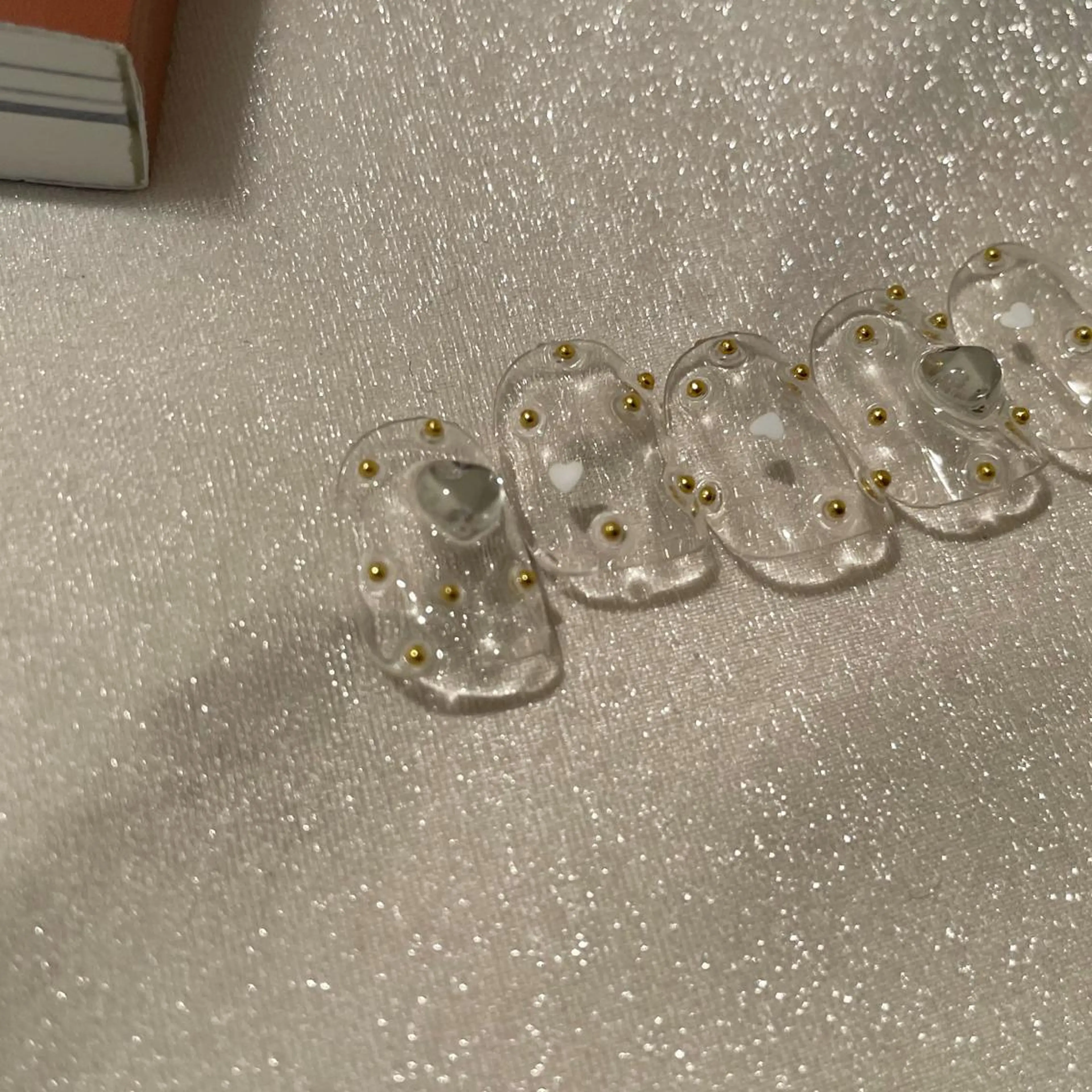 ネイル クリアネイル フレンチネイル ガーリー ゴールド ハート ハンドネイル ハンドケア lyly.nail所属・lylynail YUUKAのネイルデザイン